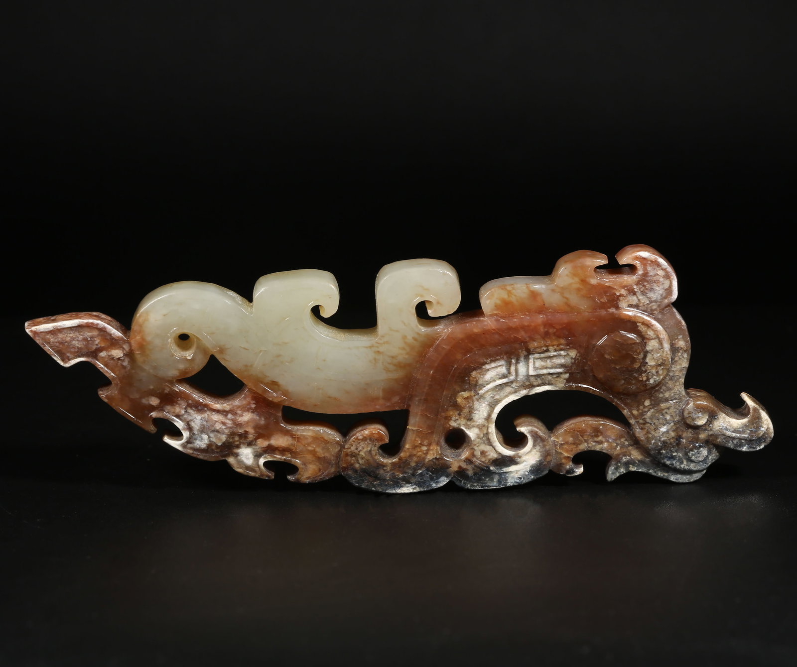 A ARCHAIC JADE PHOENIX PENDANT (1 of 8)