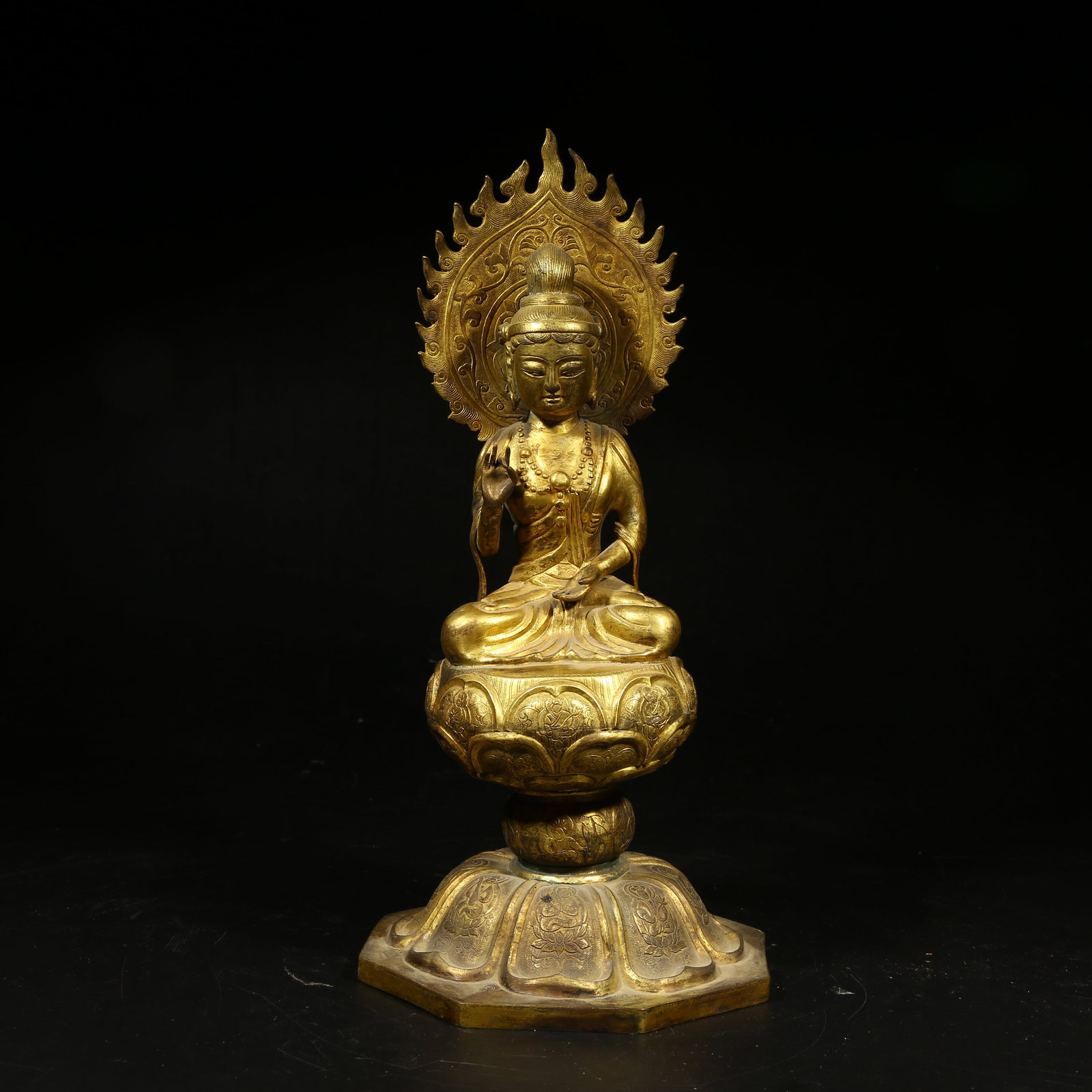 A GILT-BRONZE FIGURE OF SHAKYAMUNI BUDDHA (1 of 8)