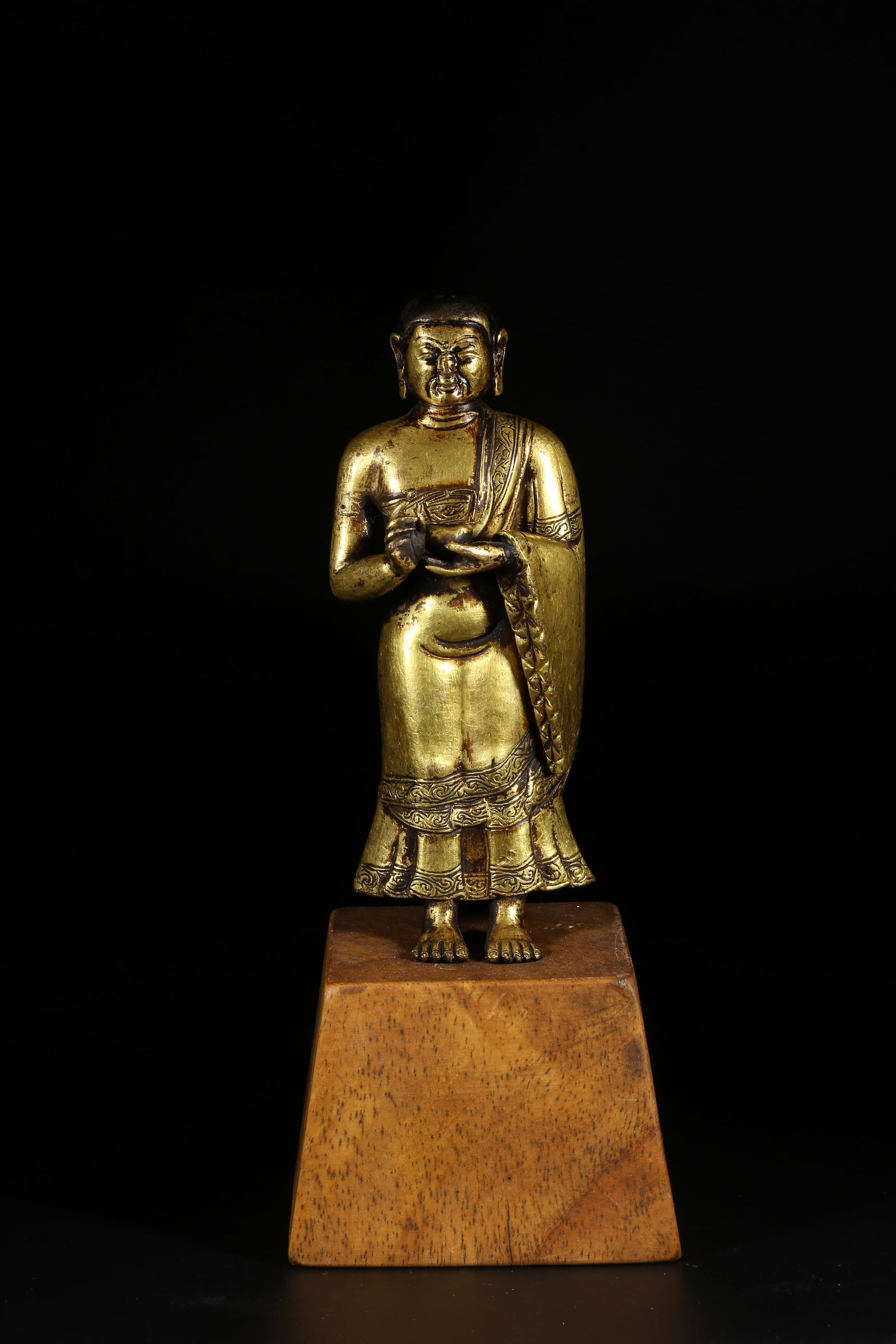 A GILT-BRONZE STANDING STATUE OF K??YAPA (ARHAT) (1 of 8)