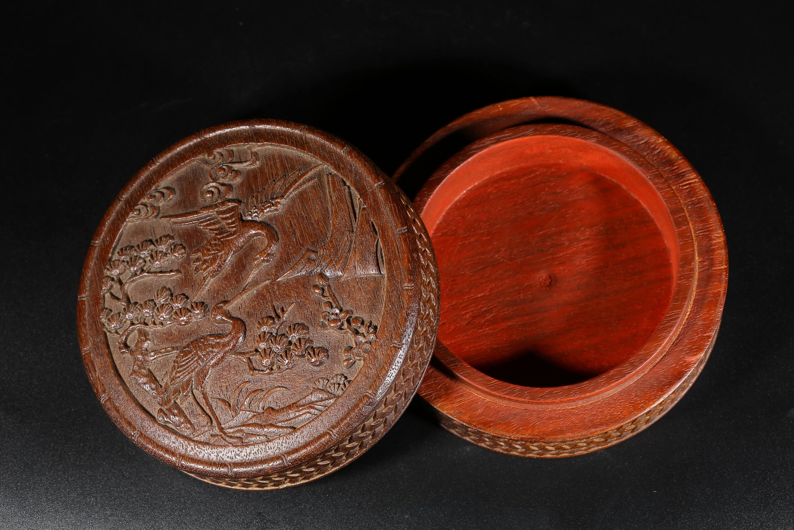 A HUANGHUALI COVERED BOX WITH PINE AND CRANE LONGEVITY MOTIF (1 of 9)