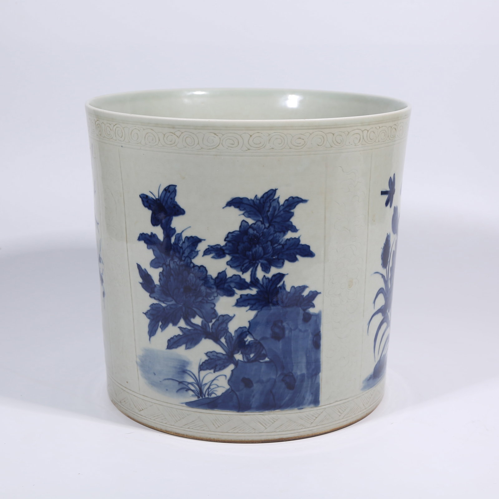 A BLUE-AND-WHITE BRUSH POT WITH FLOWER AND BIRD PATTERN (1 of 9)
