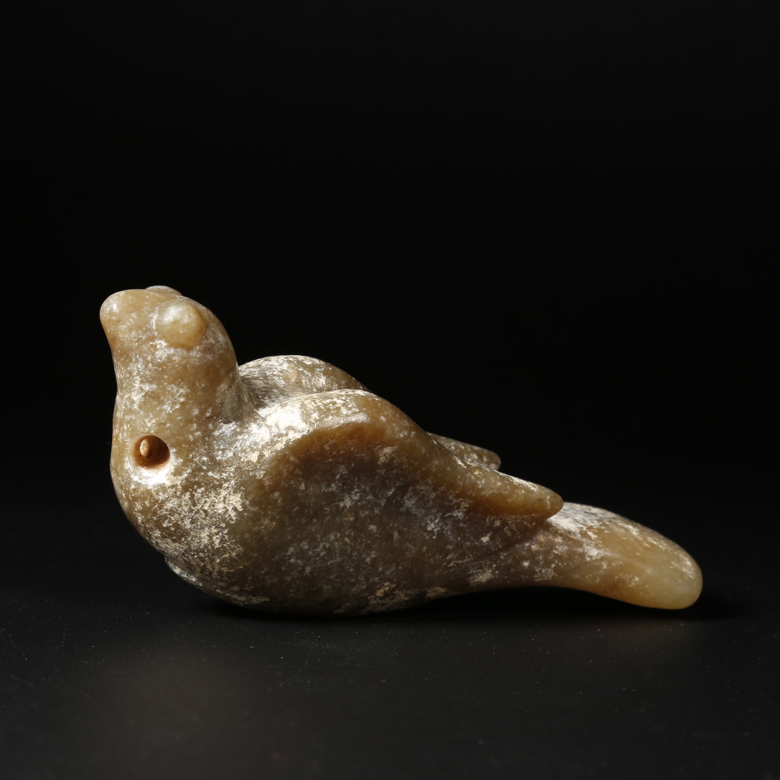 A ARCHAIC JADE BIRD (1 of 7)
