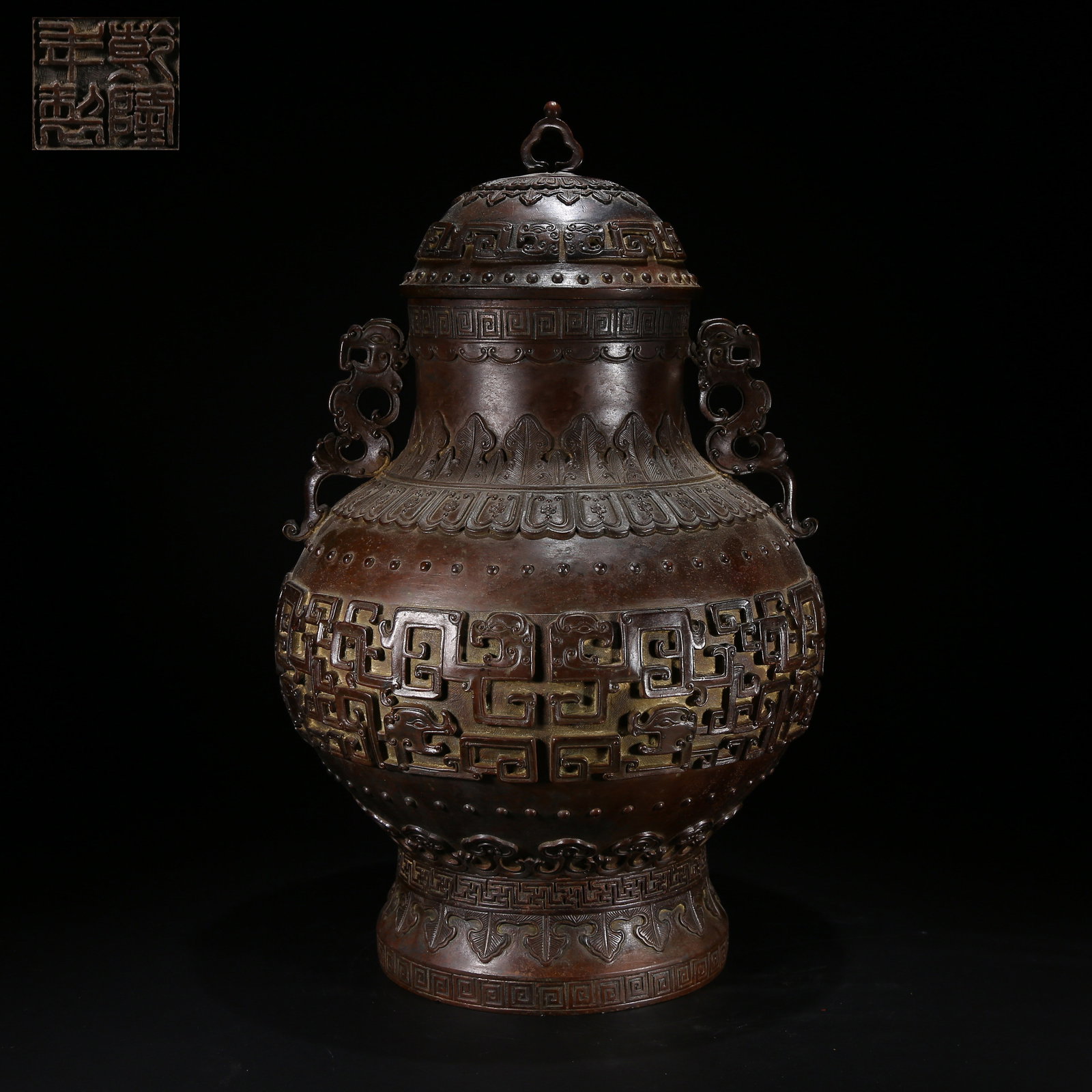 A HAN DYNASTY BRONZE KUI DRAGON EWER WITH BEAST HANDLES (1 of 9)
