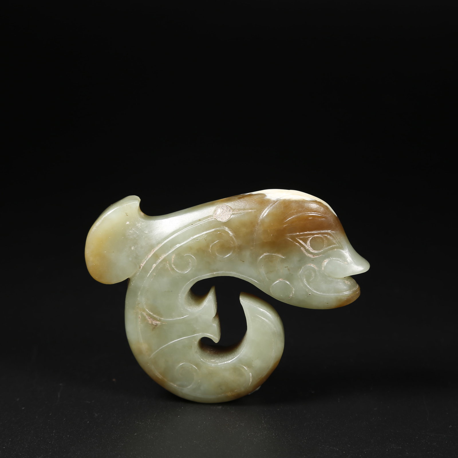 A ARCHAIC JADE MYTHICAL BEAST FIGURINE (1 of 5)