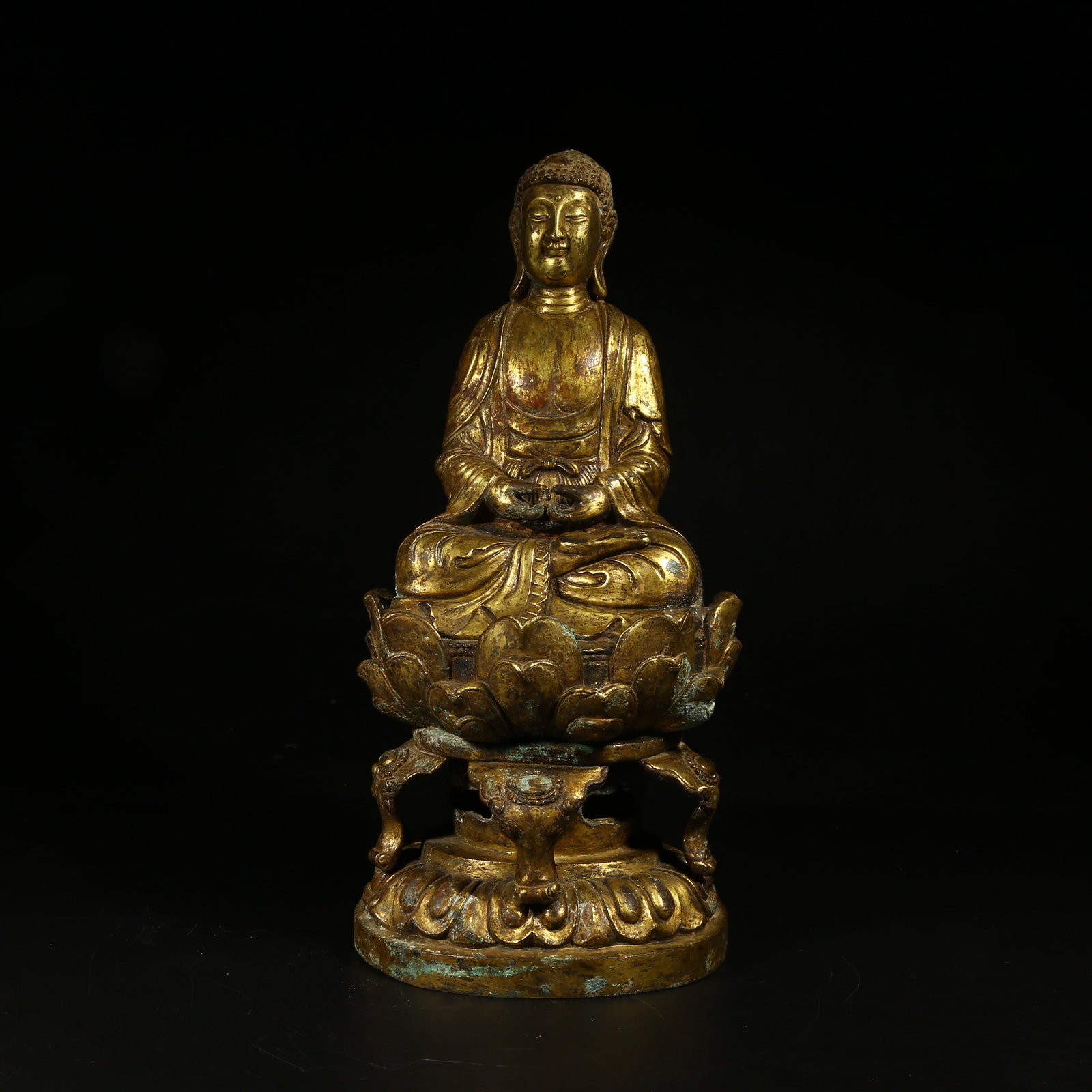 A GILT-BRONZE FIGURE OF SHAKYAMUNI BUDDHA (1 of 8)