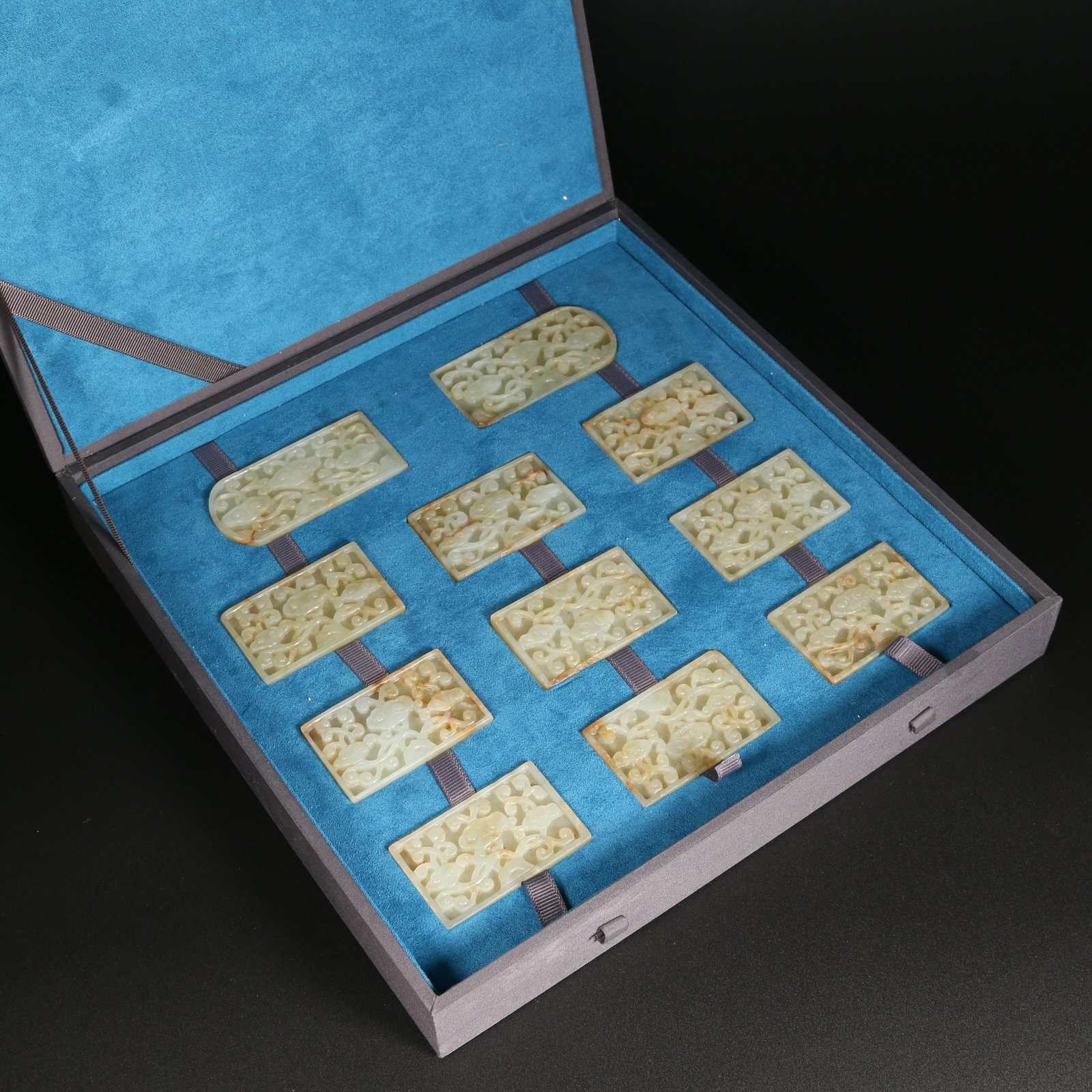 A HETIAN JADE BELT PLAQUES WITH LINGZHI DESIGN (SET): Hetian Jade Belt Plaques with Lingzhi Design (Set)