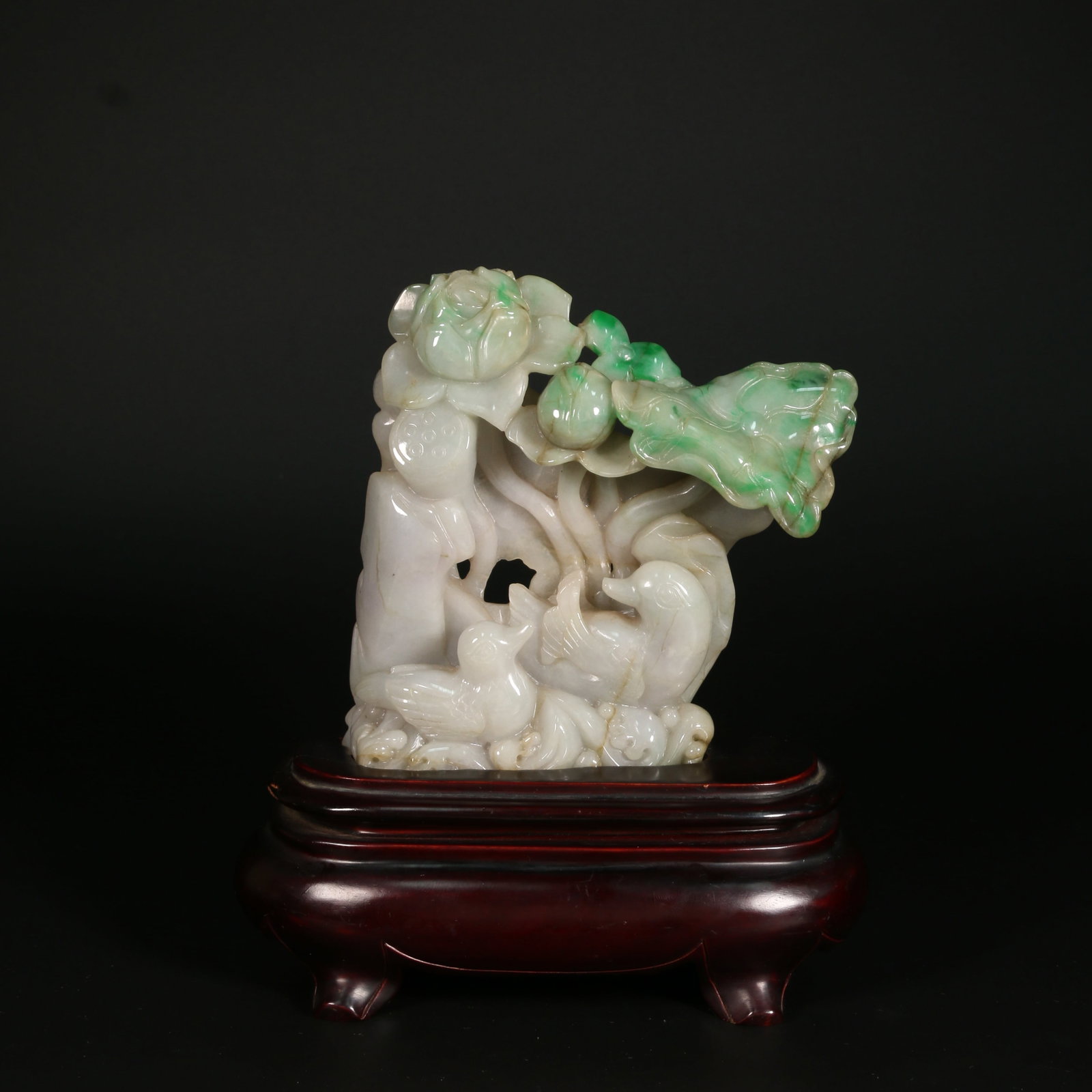 A JADEITE MOUNTAIN ORNAMENT WITH FLOWERS AND BIRDS DESIGN: Jadeite Mountain Ornament with Flowers and Birds Design