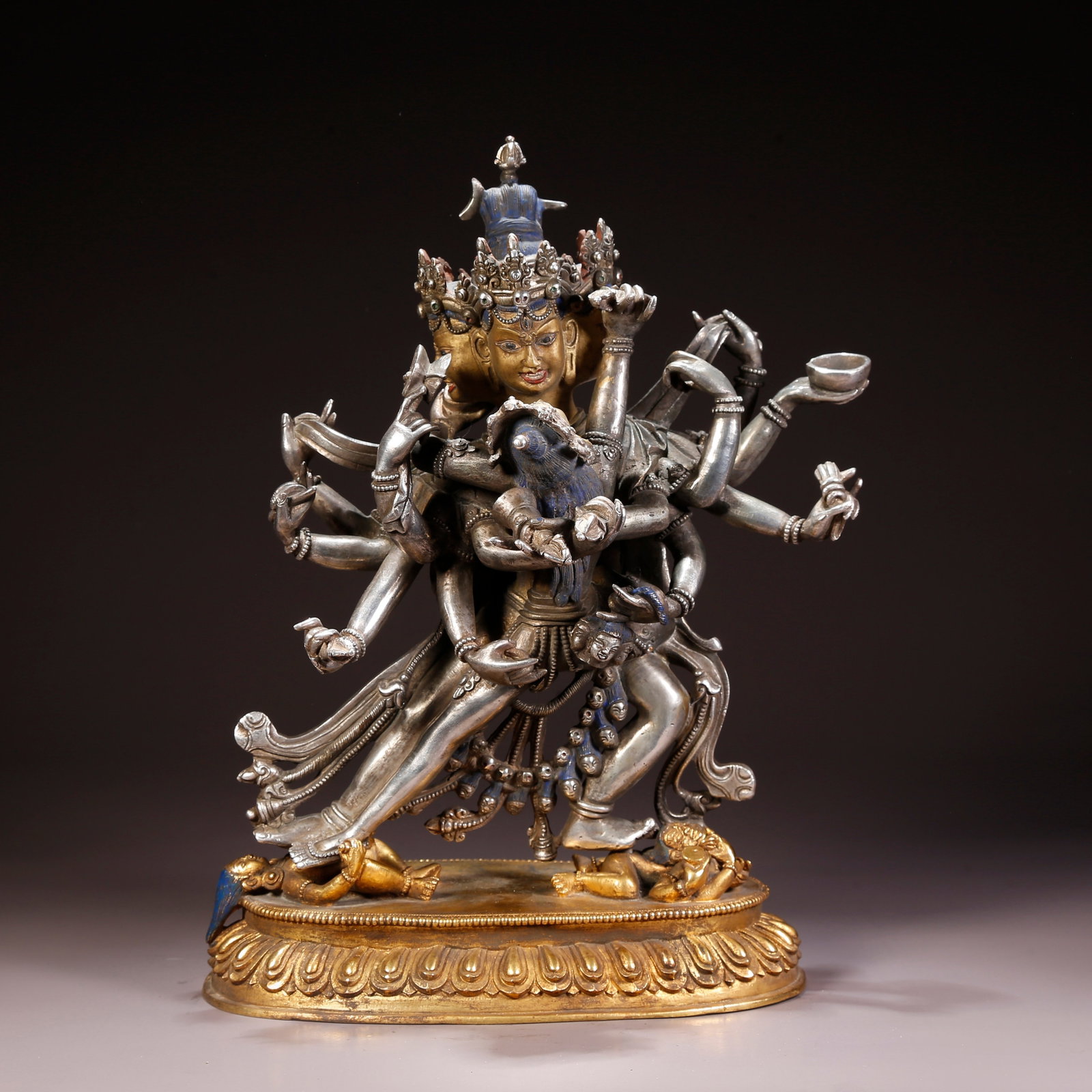 A GILT-BRONZE VAJRA HERUKA FIGURE WITH SILVER INLAY: Gilt-Bronze Vajra Heruka Figure with Silver Inlay