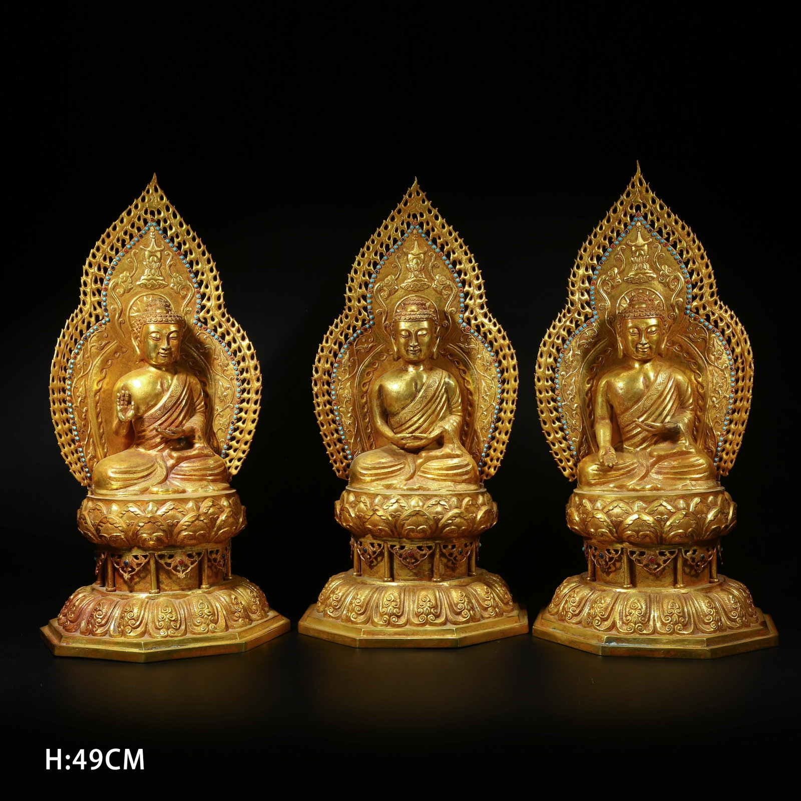 A SET OF GILT BRONZE THREE BUDDHAS OF THE PAST, PRESENT, AND FUTURE (1 of 11)
