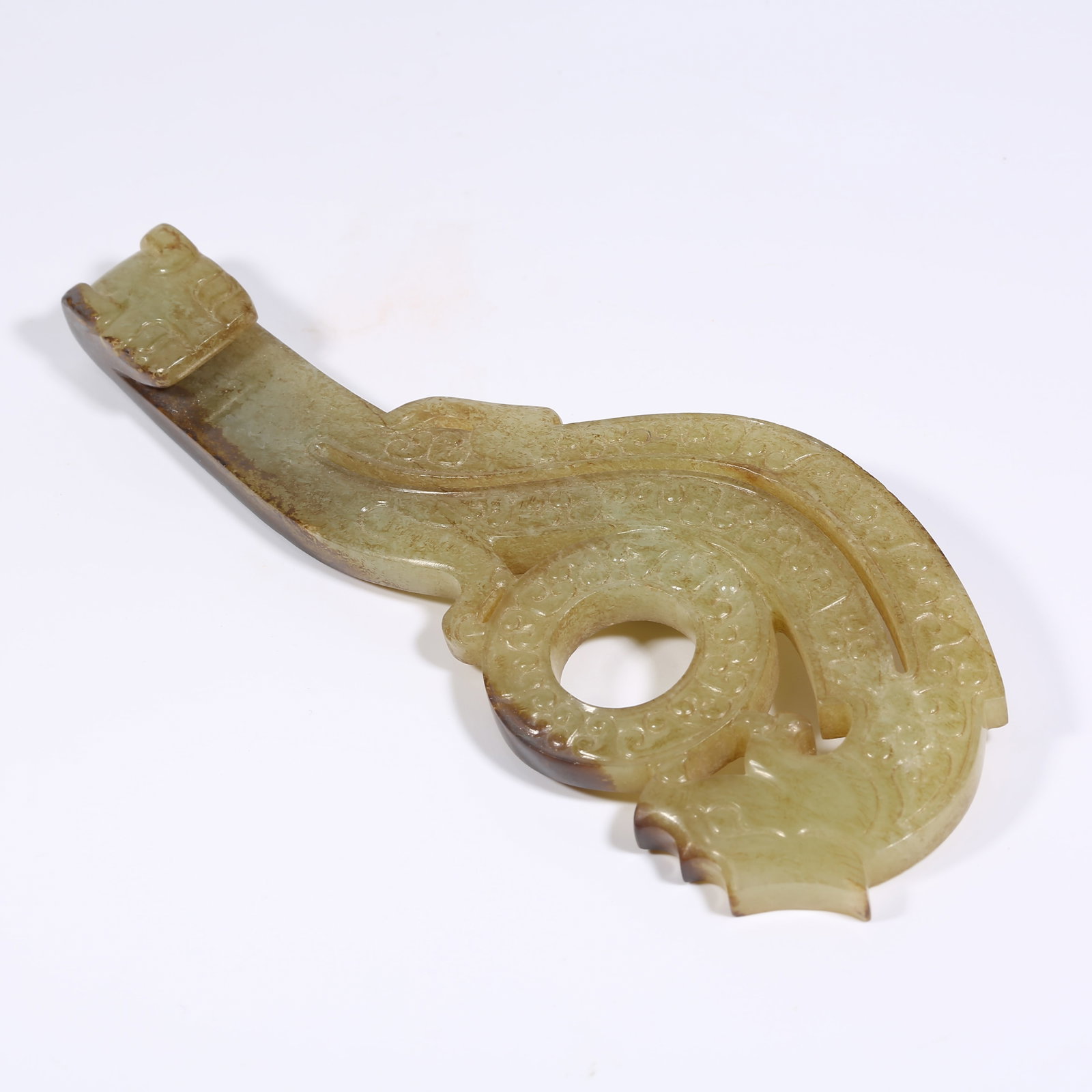 A ANCIENT JADE BELT HOOK WITH DRAGON MOTIF (1 of 9)
