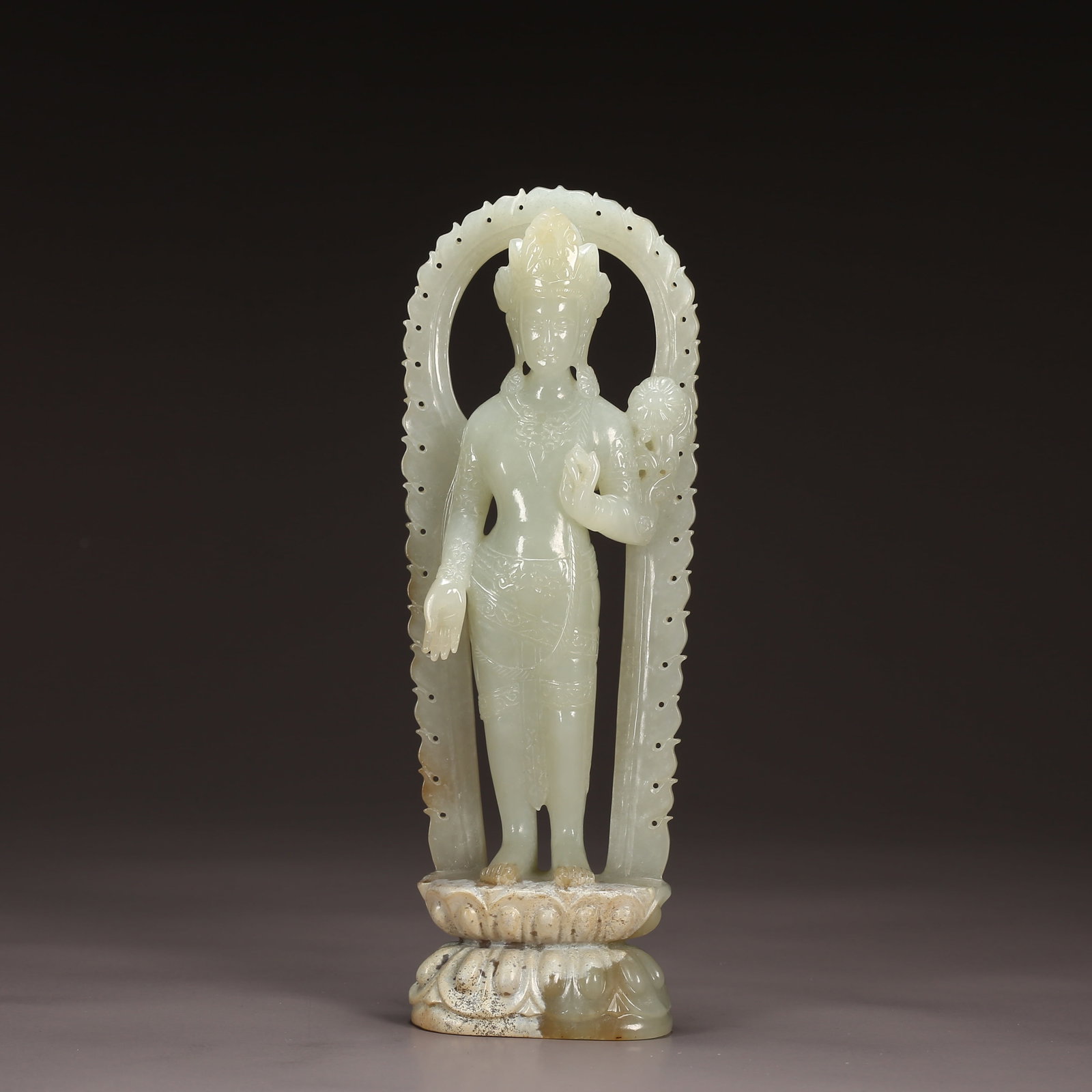 A HETIAN JADE STANDING HAND GUANYIN ON LOTUS: Hetian Jade Standing Hand Guanyin on Lotus