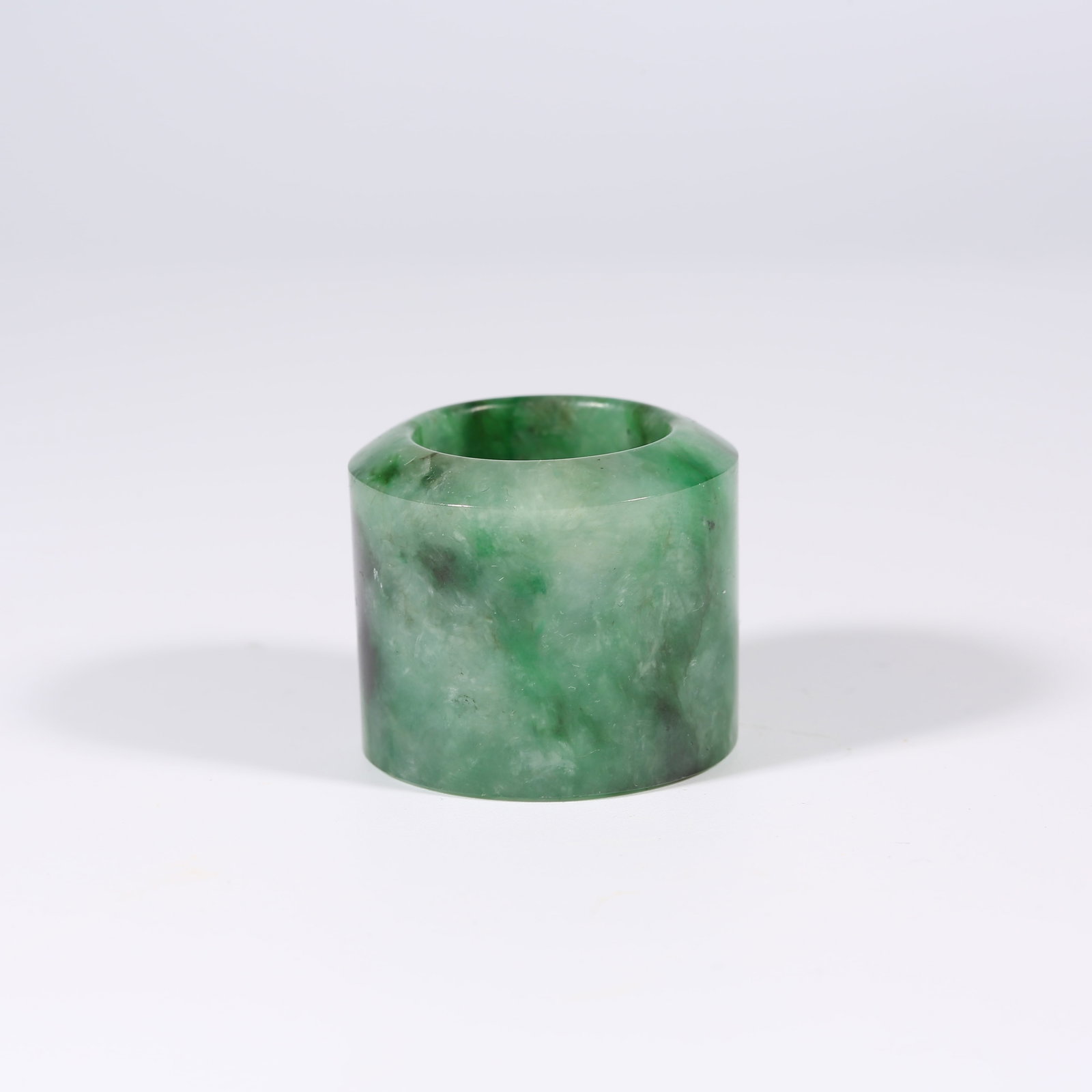 A JADEITE THUMB RING (1 of 9)