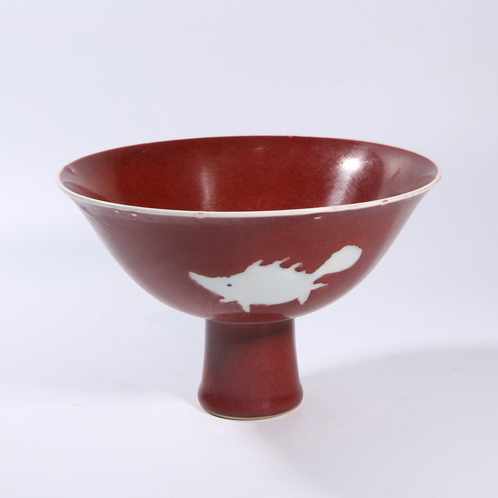 A ROUGE-DE-FER GROUND RESERVED FISH-PATTERN HIGH-FOOT BOWL (1 of 9)