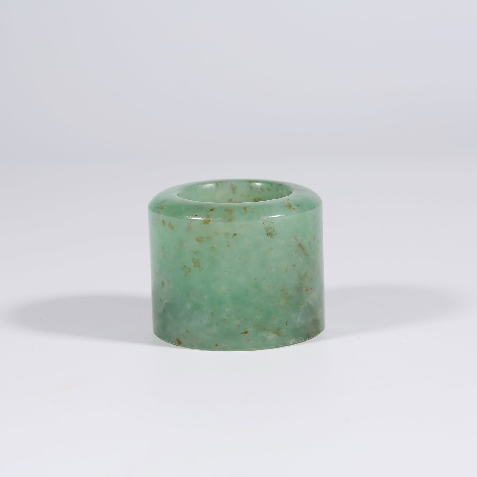 A JADEITE THUMB RING (1 of 9)