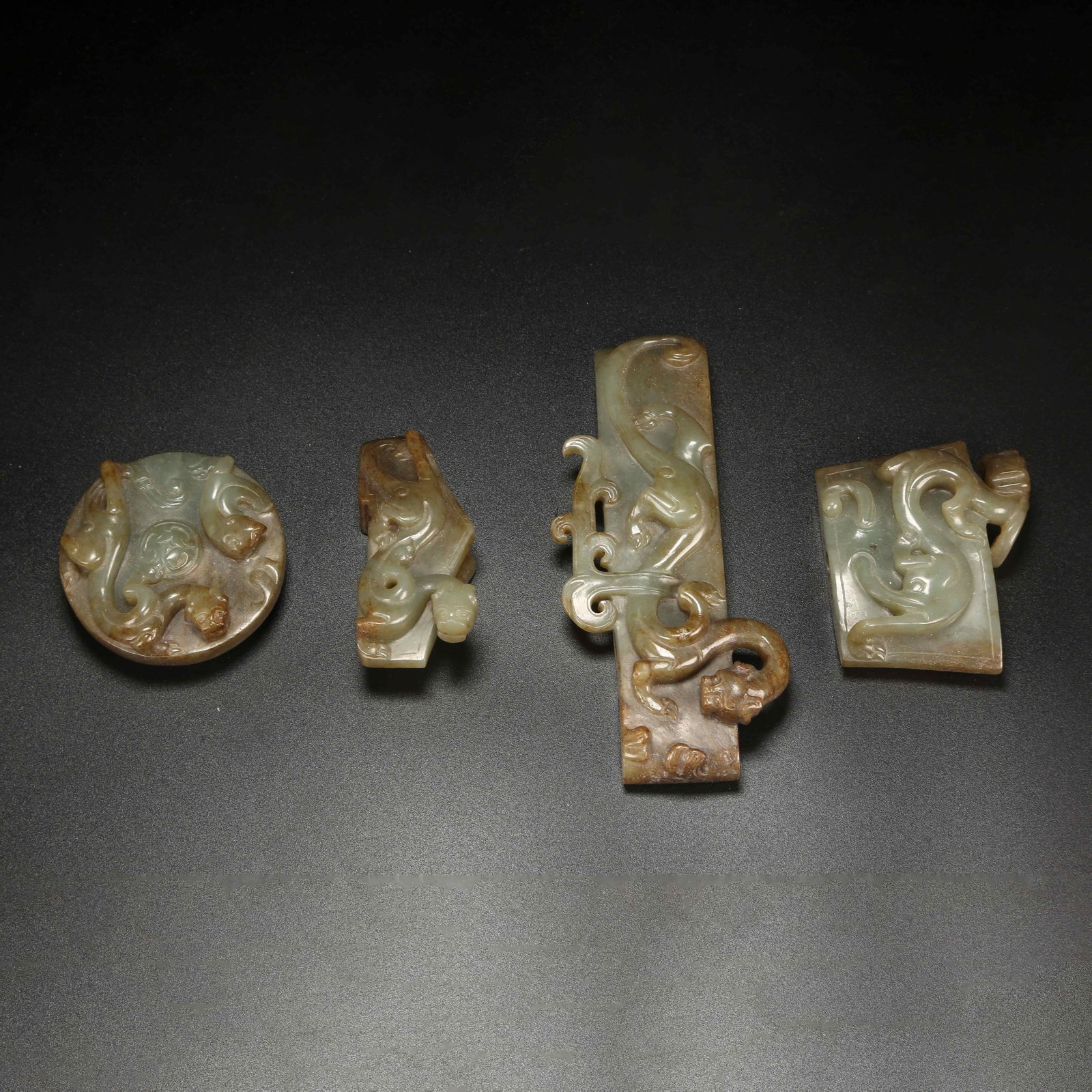 A SET OF ANCIENT JADE SWORD ORNAMENTS: Set of Ancient Jade Sword Ornaments