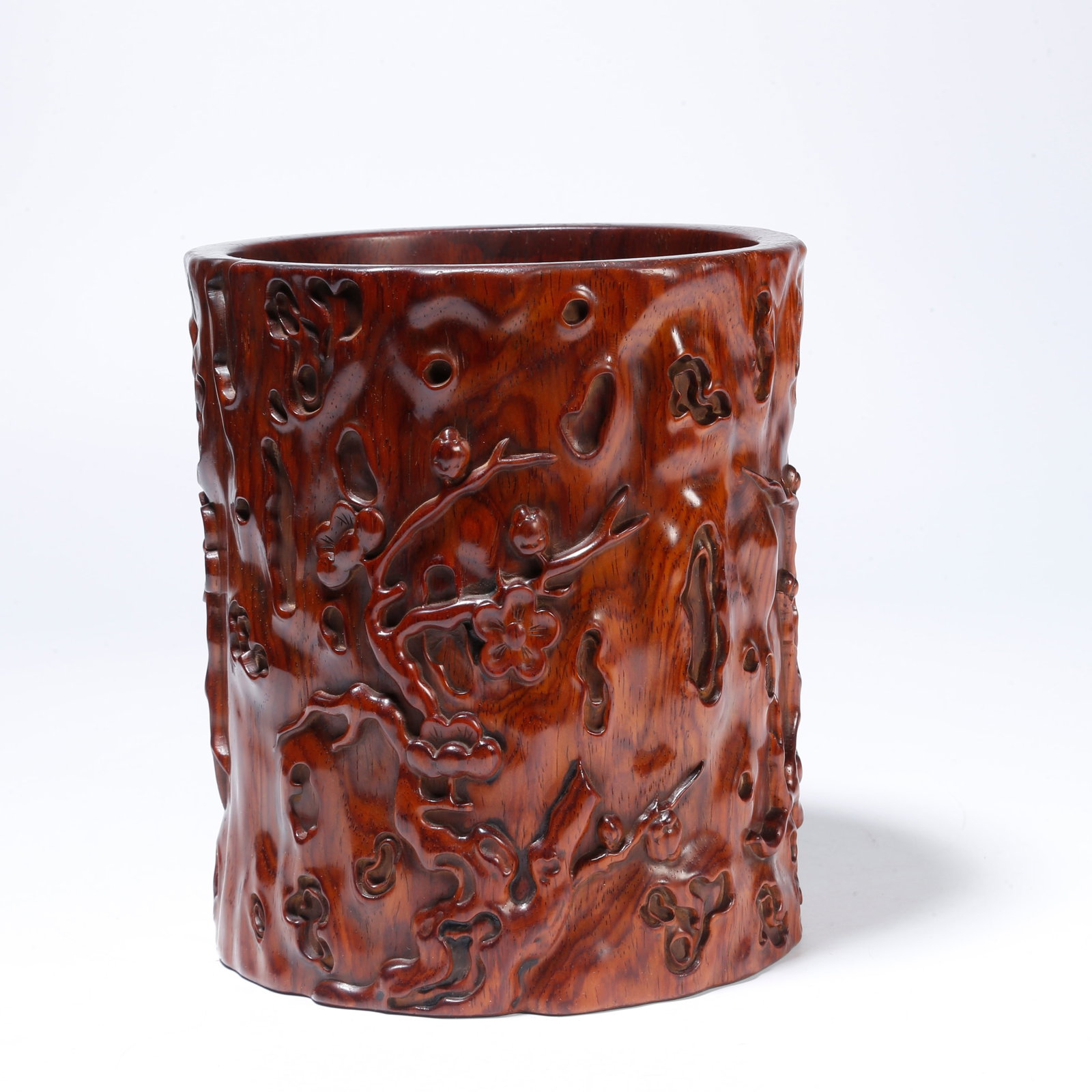 A HUANGHUALI BRUSH POT WITH PLUM BLOSSOM DESIGN: Huanghuali Brush Pot with Plum Blossom Design