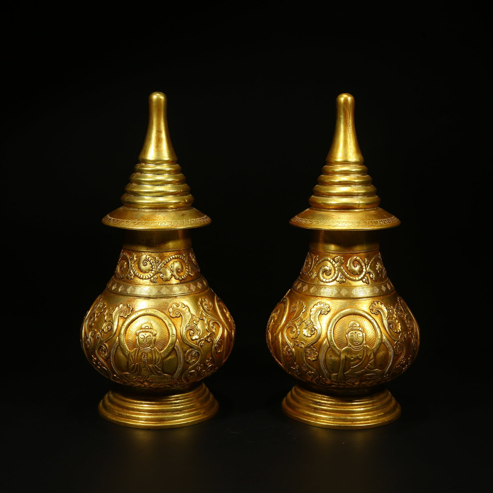 A SET OF GILT BRONZE INCENSE HOLDERS ("XIANG BAOZI"): Set of Gilt Bronze Incense Holders ("Xiang Baozi")