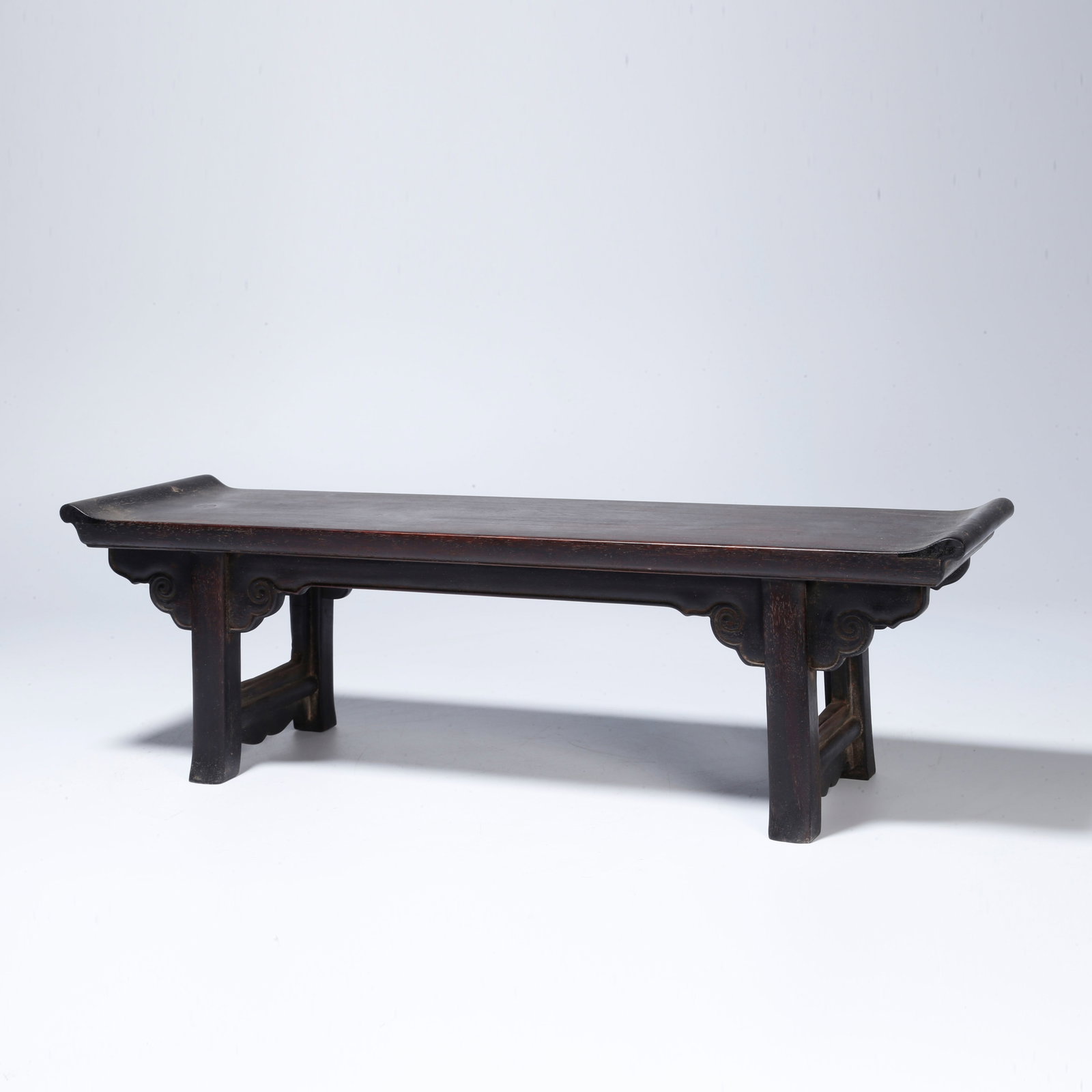 A ZITAN WOOD STAND WITH AUSPICIOUS CLOUD DESIGN: Zitan Wood Stand with Auspicious Cloud Design