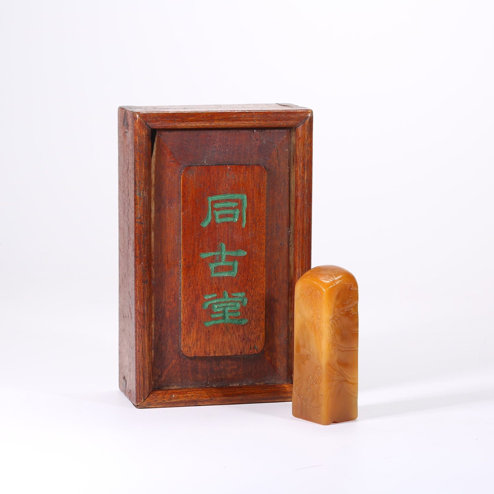 A SHOUSHAN TIANHUANG STONE SEAL CARVED WITH LANDSCAPE AND FIGURE MOTIF: Shoushan Tianhuang stone seal carved with landscape and figure motif