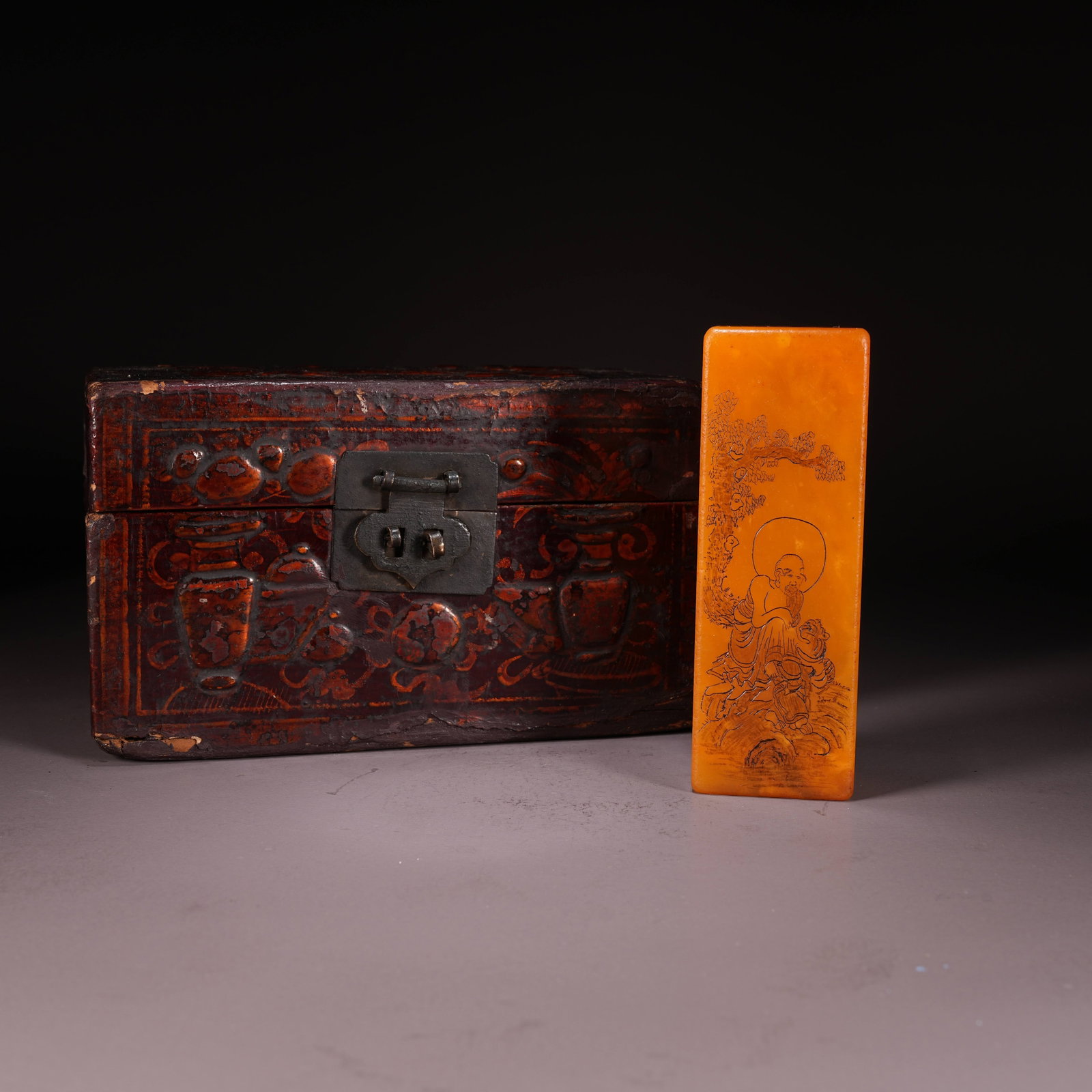 A SHOUSHAN STONE SEAL WITH SUBDUED TIGER AND ARHAT MOTIF: Shoushan Stone Seal with Subdued Tiger and Arhat Motif
