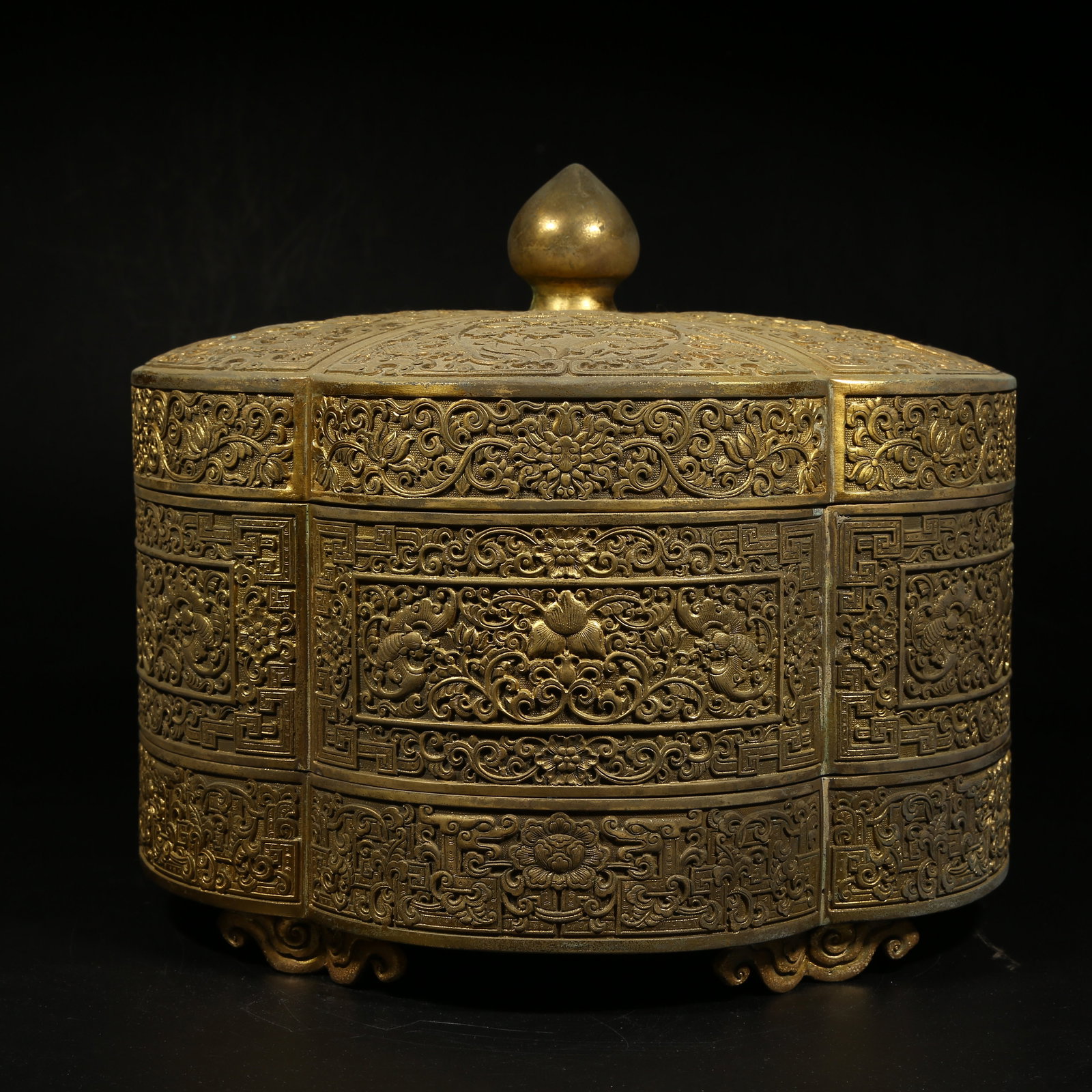 A GILDED BRONZE MULTI-TIERED LIDDED BOX WITH BLESSINGS AND LONGEVITY MOTIFS (1 of 11)