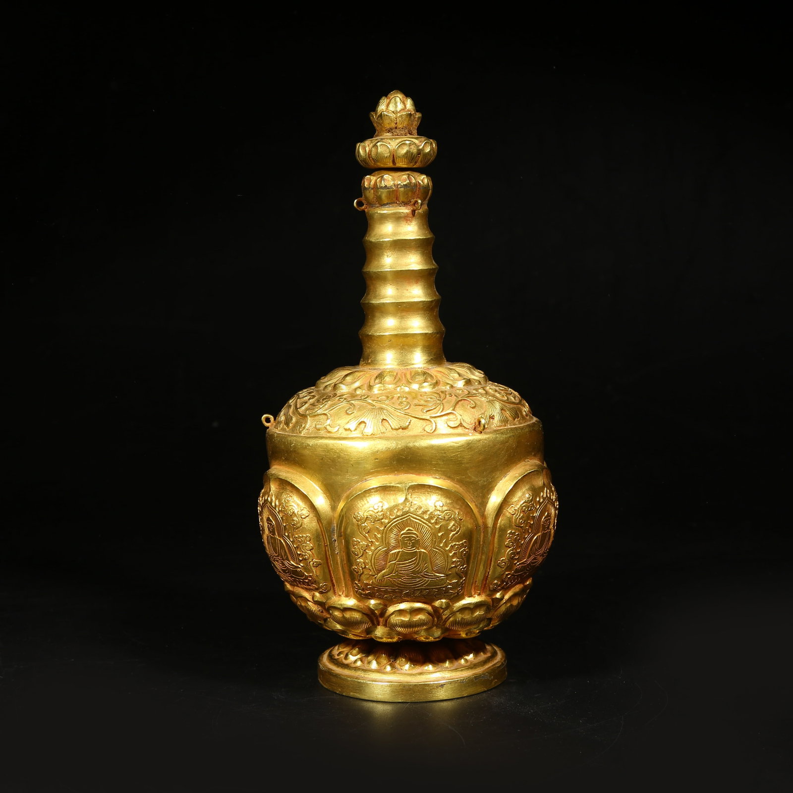 A GILDED BRONZE LONG-NECK VASE WITH BUDDHA IMAGERY (1 of 9)