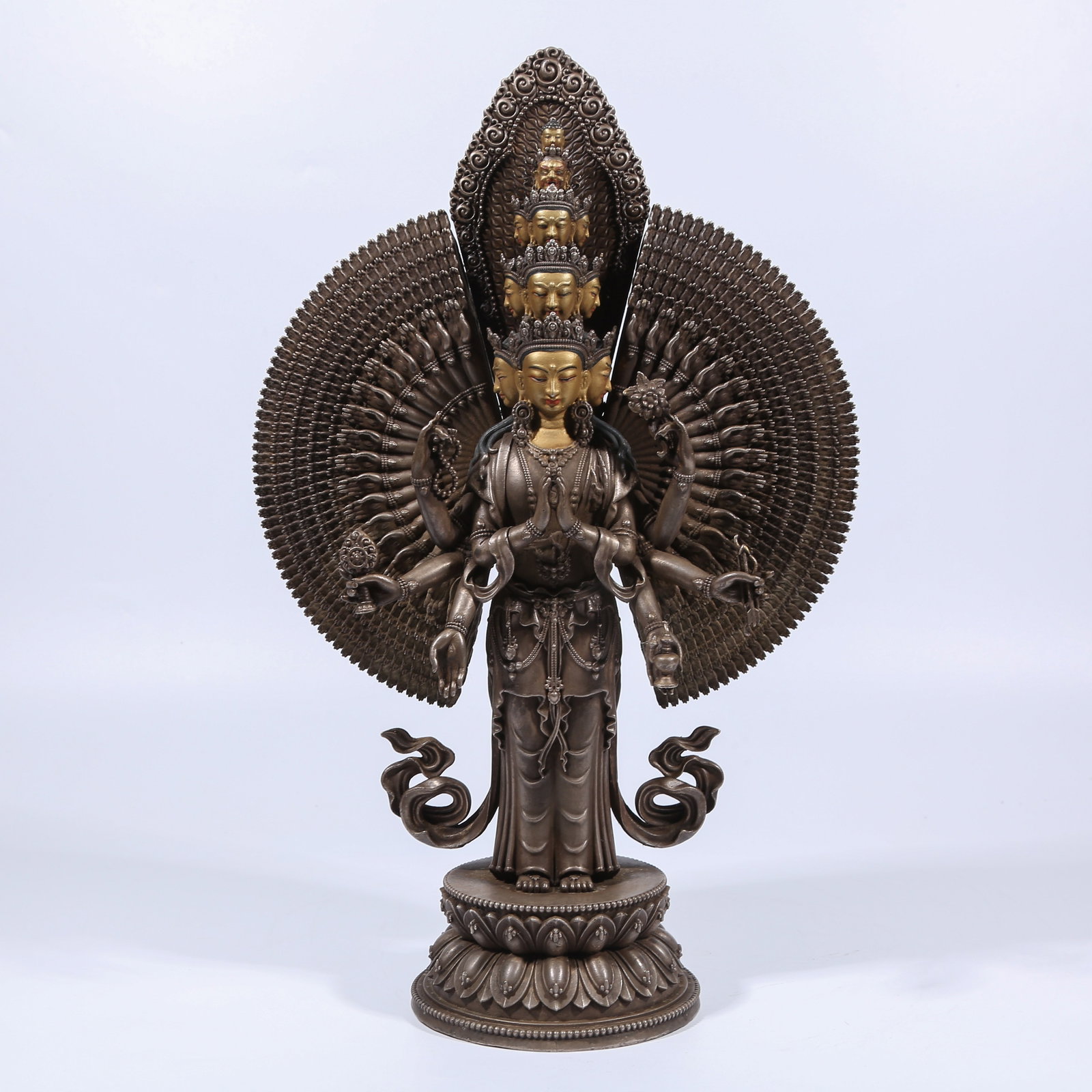 A TIBETAN SILVER THOUSAND-ARMED AVALOKITESHVARA STATUE: Tibetan Silver Thousand-Armed Avalokiteshvara Statue