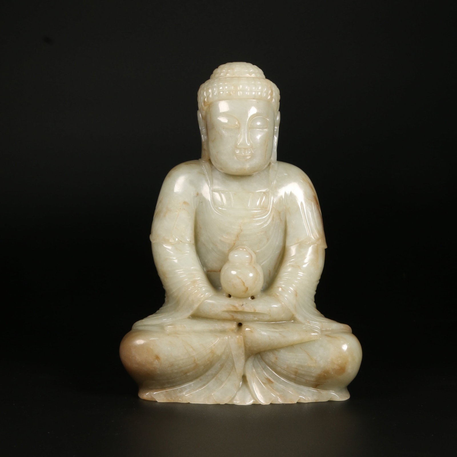 A HETIAN JADE BUDDHA STATUE (1 of 11)