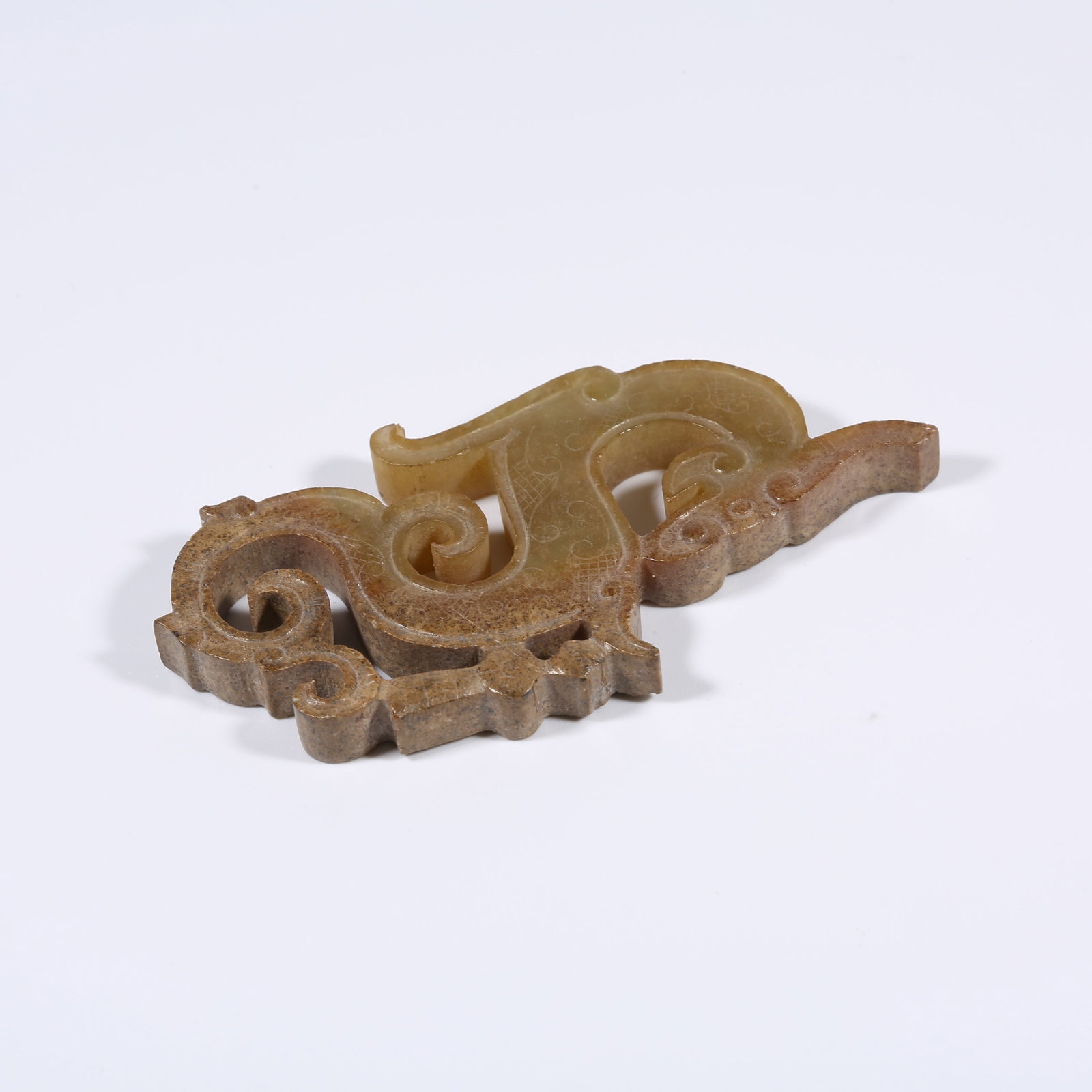A ANCIENT JADE DRAGON-SHAPED PENDANT: Ancient Jade Dragon-Shaped Pendant