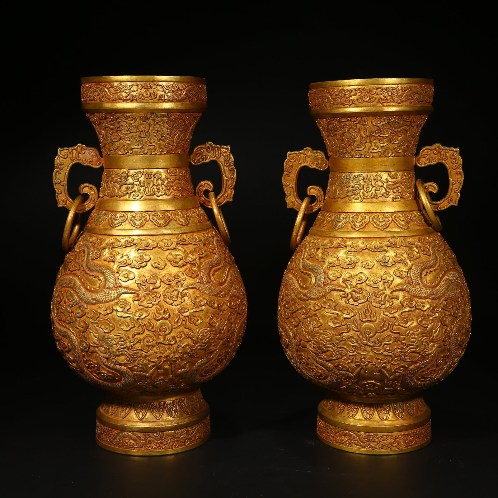 A SET OF GILT BRONZE CLOUD AND DRAGON-PATTERNED VASE WITH MOVABLE RING MOUTH: Set of gilt bronze cloud and dragon-patterned vase with movable ring mouth