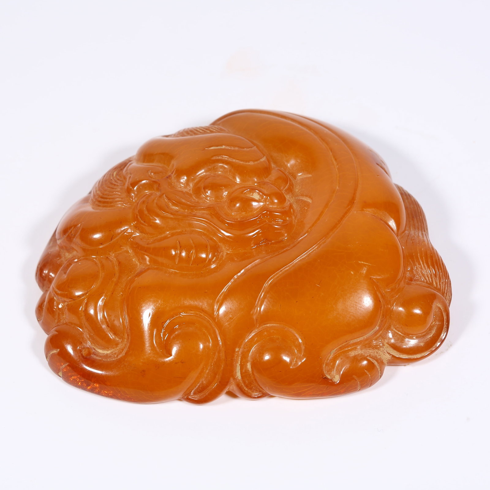A AMBER BELT ORNAMENT WITH AUSPICIOUS BEAST MOTIF: Amber Belt Ornament with Auspicious Beast Motif