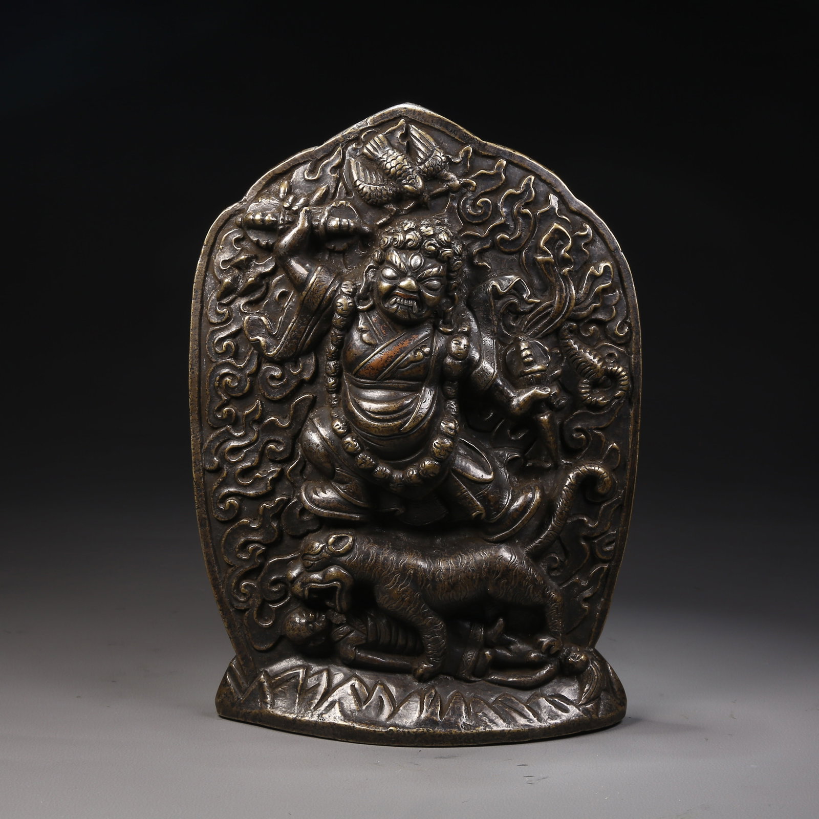 A ALLOY BRONZE WRATHFUL PADMASAMBHAVA (GURU RINPOCHE IN ONE OF HIS EIGHT MANIFESTATIONS) STATUE: Alloy bronze wrathful Padmasambhava (Guru Rinpoche in one of his eight manifestations) statue inlaid with red bronze