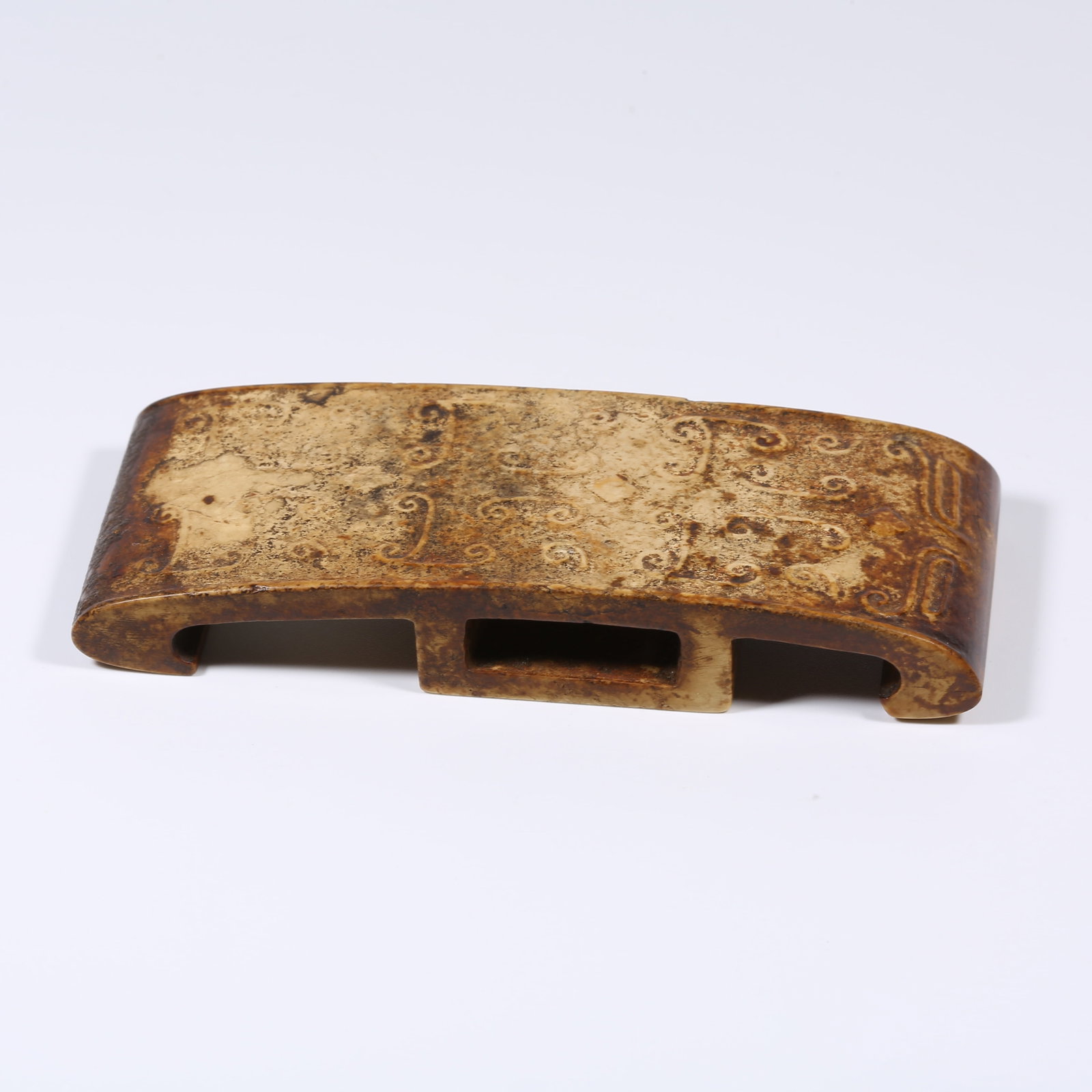 A ANCIENT JADE SWORD ORNAMENT WITH INTERLINKED CLOUD PATTERN: Ancient Jade Sword Ornament with Interlinked Cloud Pattern