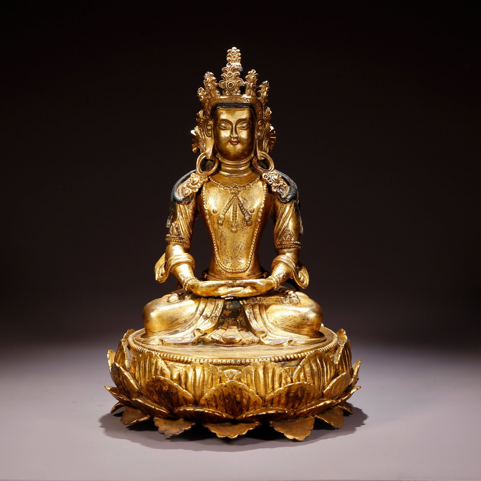 A GILT-BRONZE AMITAYUS (INFINITE-LIFE BUDDHA) FIGURE (1 of 9)