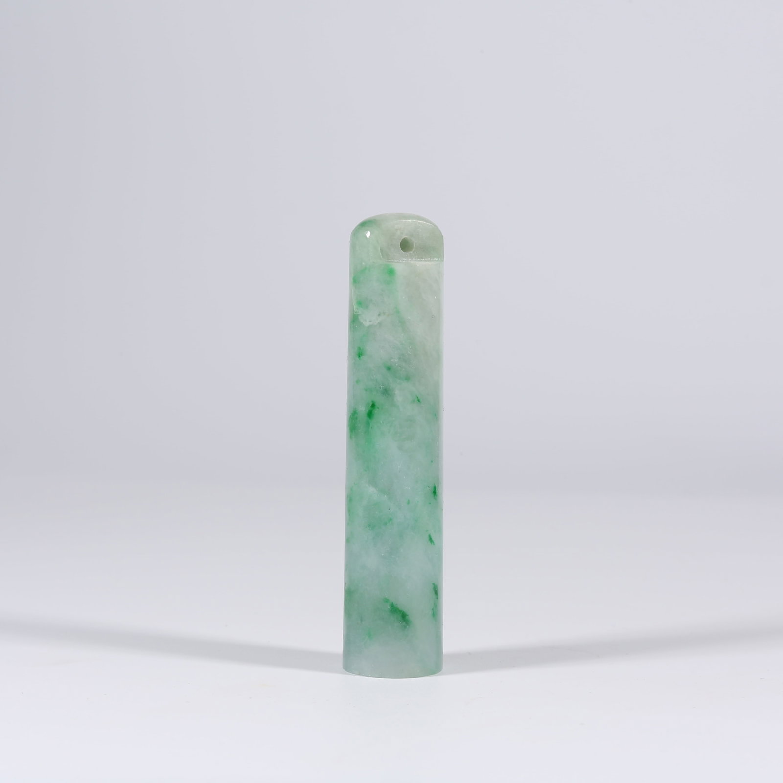 A JADEITE FEATHER TUBE (1 of 9)