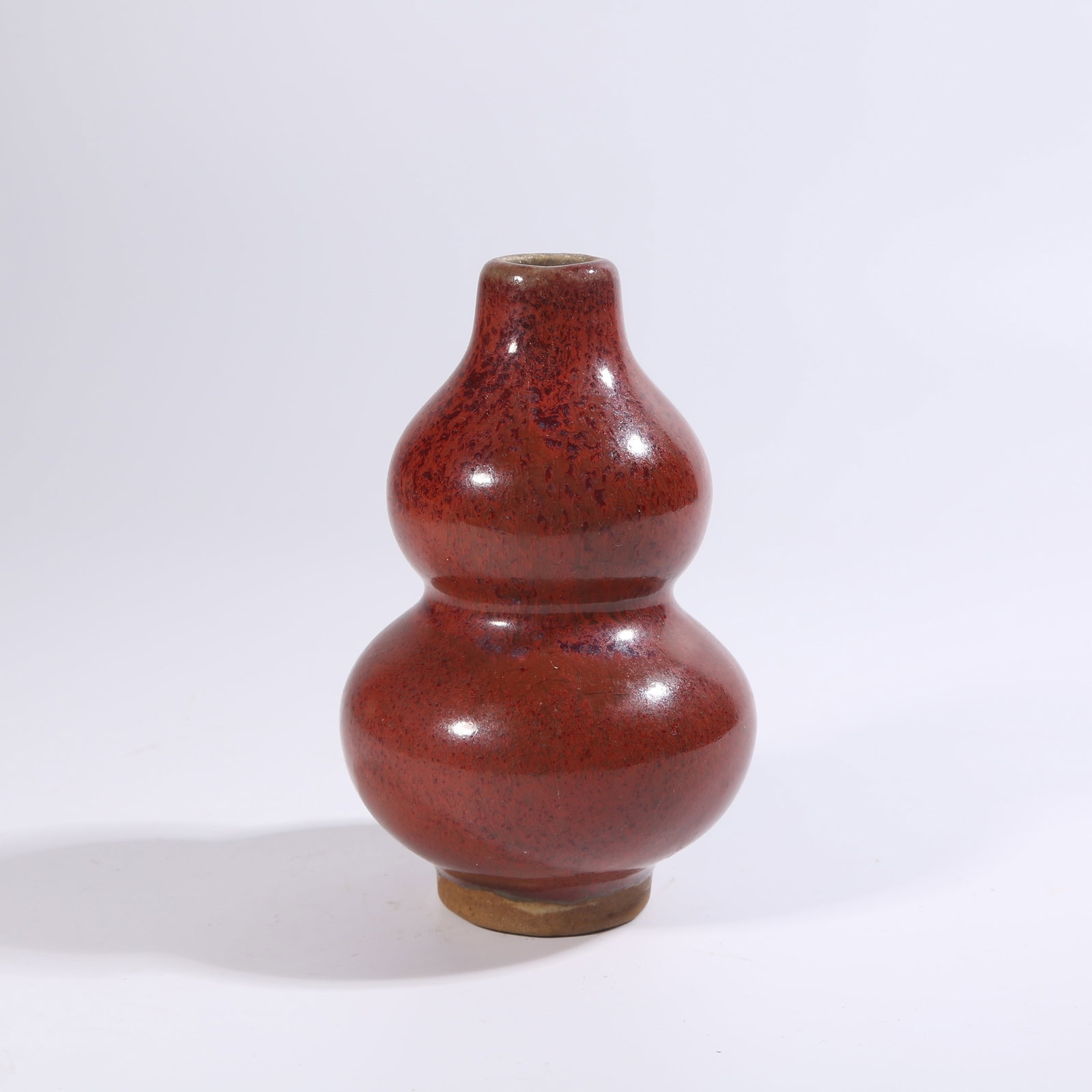 A LANG KILN RED-GLAZED GOURD VASE (1 of 9)