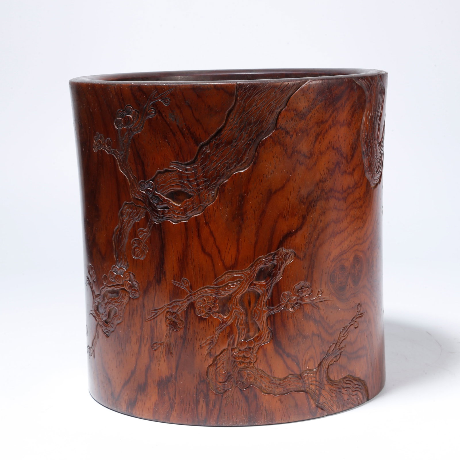A HUANGHUALI BRUSH POT WITH FLORAL DESIGN: Huanghuali Brush Pot with Floral Design