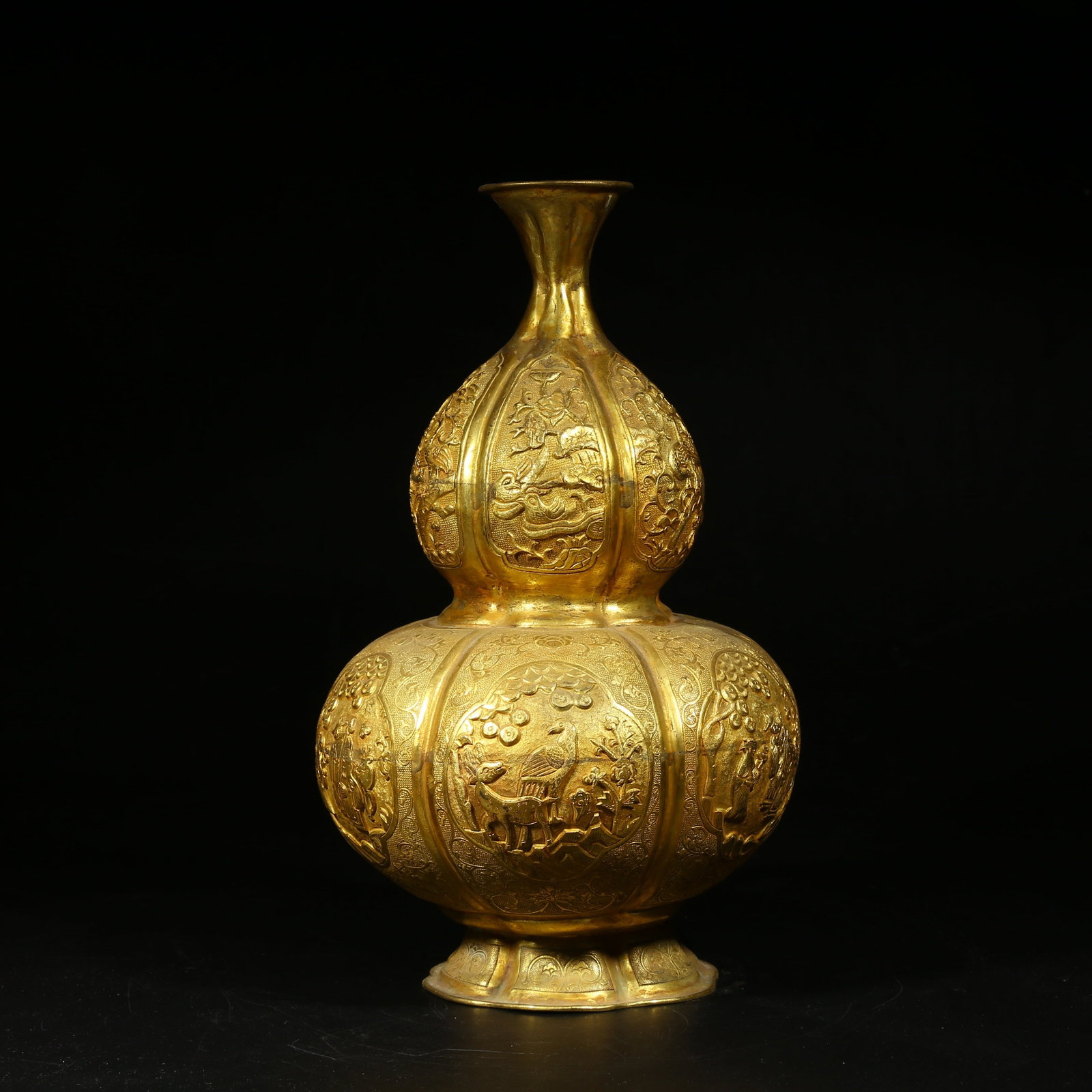 A GILDED BRONZE GOURD-SHAPED VASE WITH NARRATIVE SCENES (1 of 9)