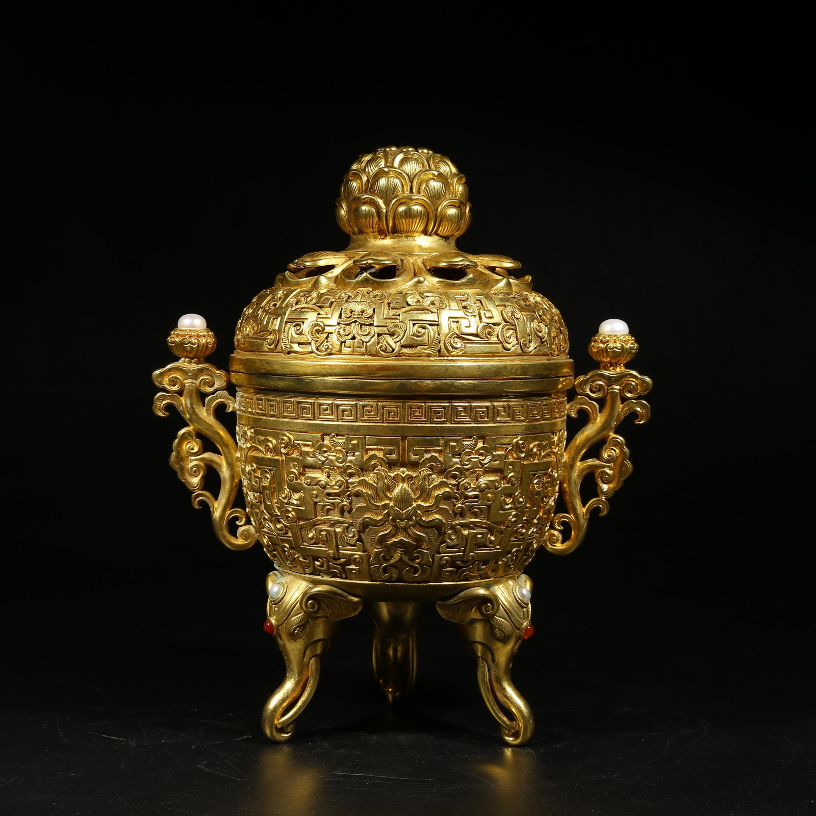 A GILDED BRONZE INCENSE BURNER WITH BAOXIANGHUA FLORAL DESIGN: Gilded bronze incense burner with baoxianghua floral design