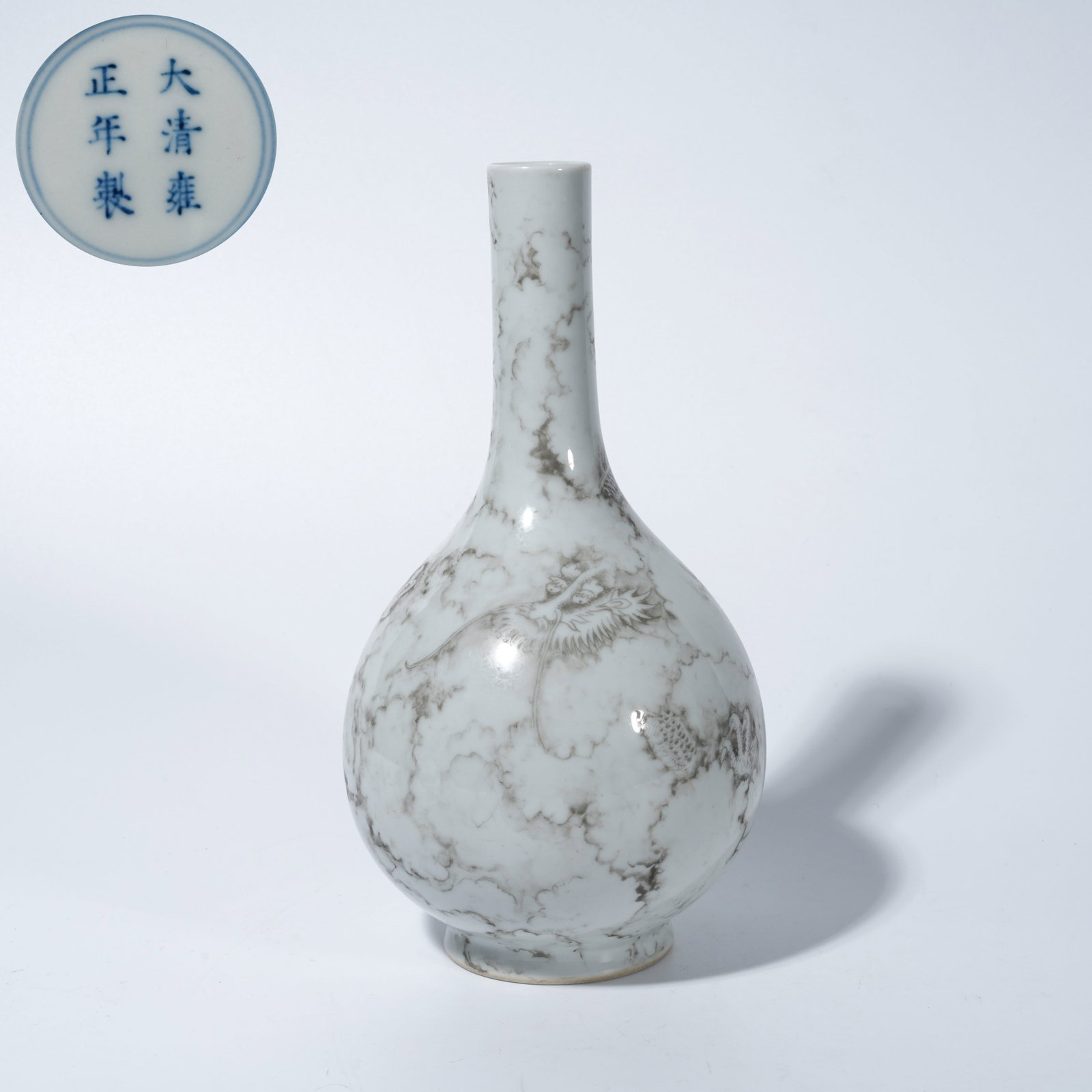 A INK-AND-COLOR VASE WITH CLOUD-AND-DRAGON MOTIF: Ink-and-Color Vase with Cloud-and-Dragon Motif