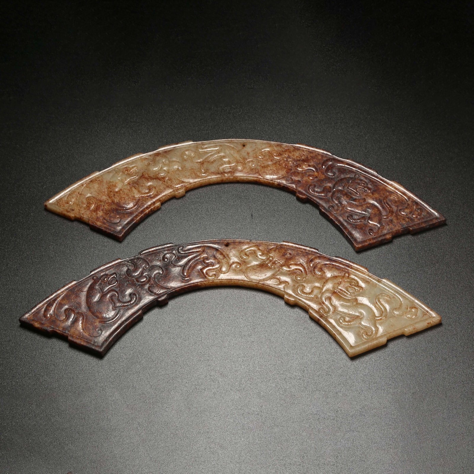 A SET OF ANCIENT JADE HUANG PENDANTS WITH AUSPICIOUS BEAST PATTERN: Set of Ancient Jade Huang Pendants with Auspicious Beast Pattern