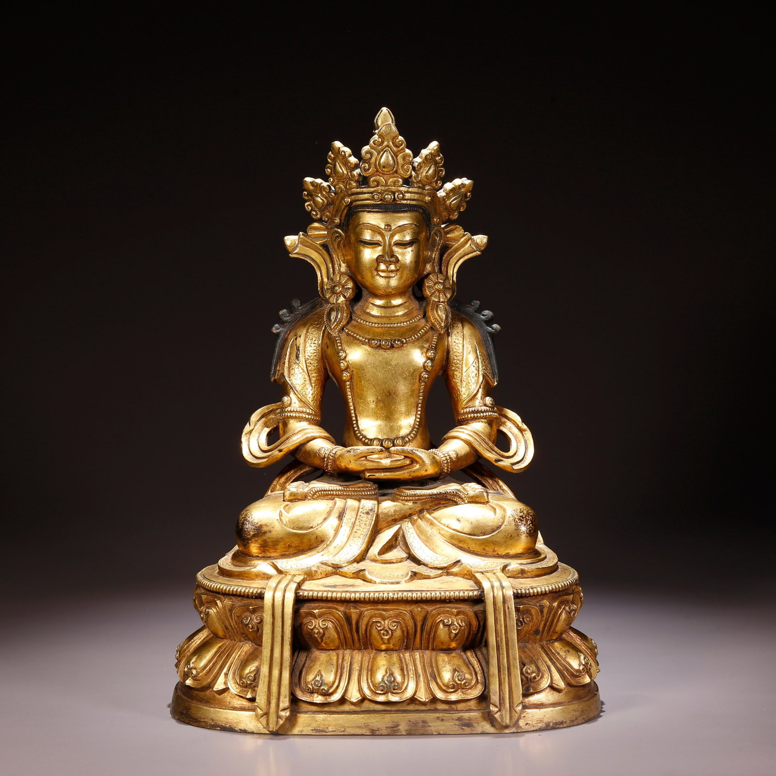 A GILT-BRONZE AMITAYUS (INFINITE-LIFE BUDDHA) FIGURE (1 of 9)