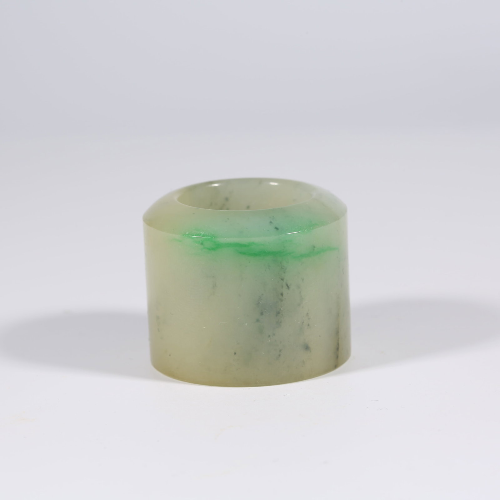 A JADEITE THUMB RING (1 of 9)