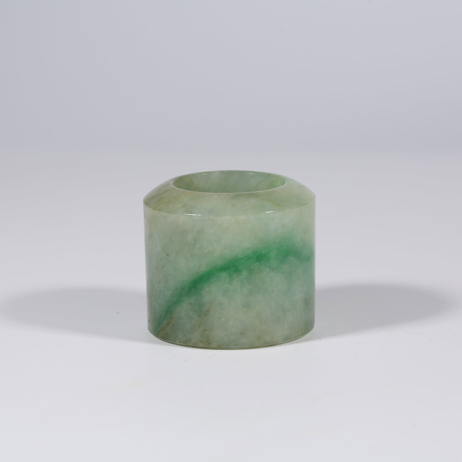 A JADEITE THUMB RING (1 of 9)
