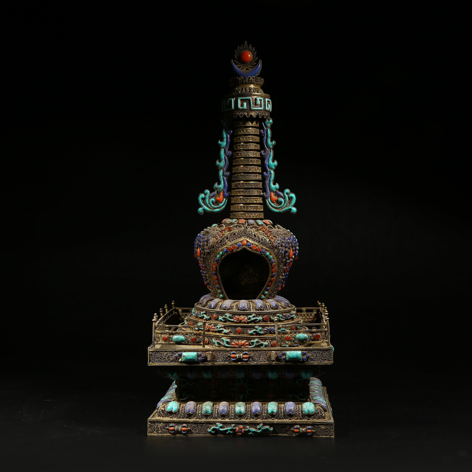 A SILVER STUPA INLAID WITH GEMS: Silver stupa inlaid with gems