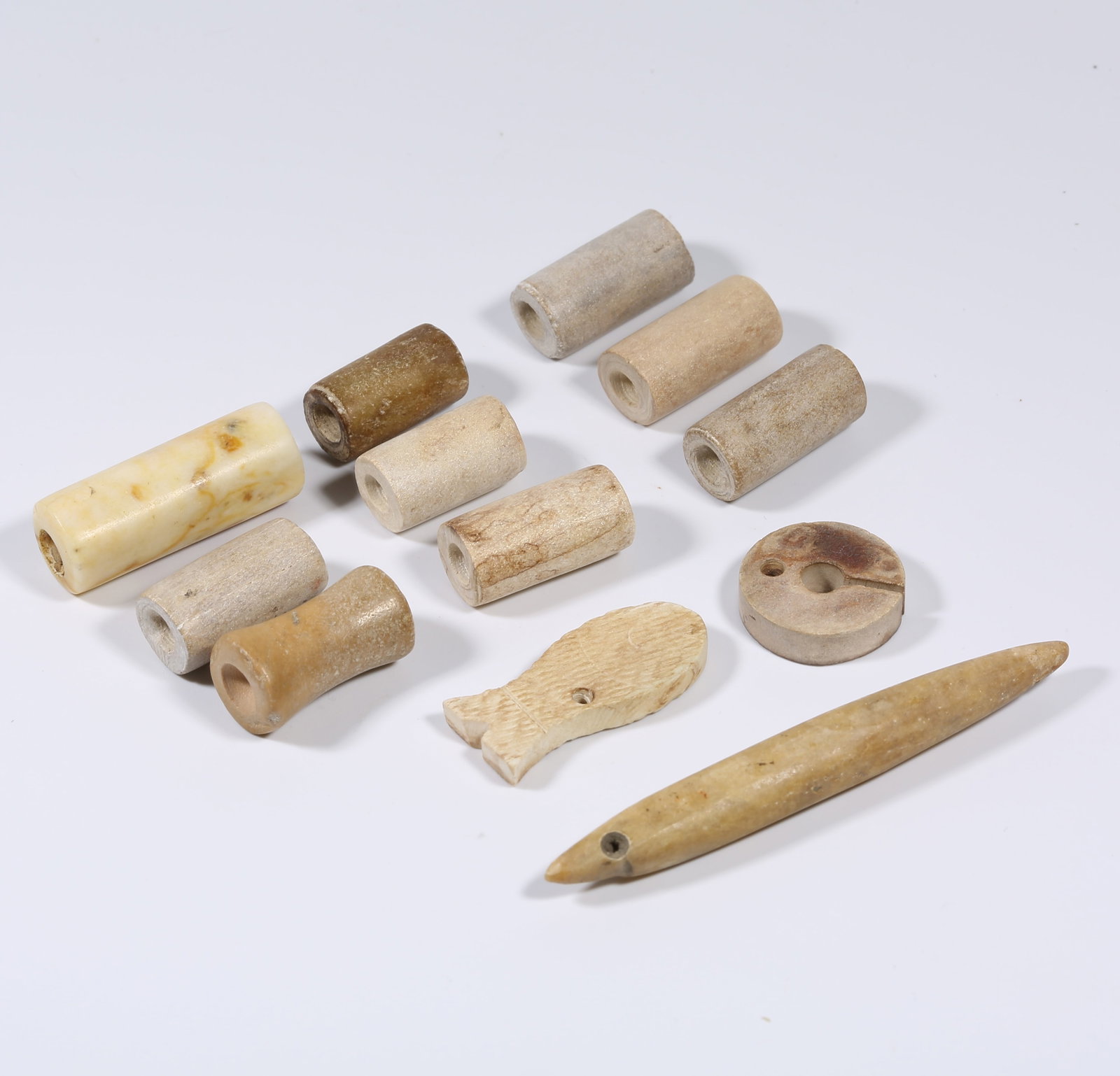 A SET OF ANCIENT JADE STRING ORNAMENTS: Set of Ancient Jade String Ornaments