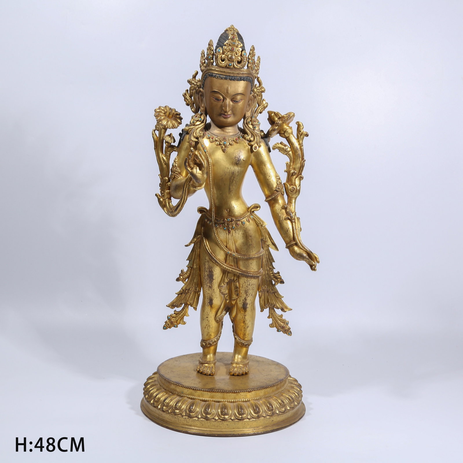 A GILT BRONZE LOTUS-HAND AVALOKITESHVARA STANDING STATUE: Gilt Bronze Lotus-Hand Avalokiteshvara Standing Statue