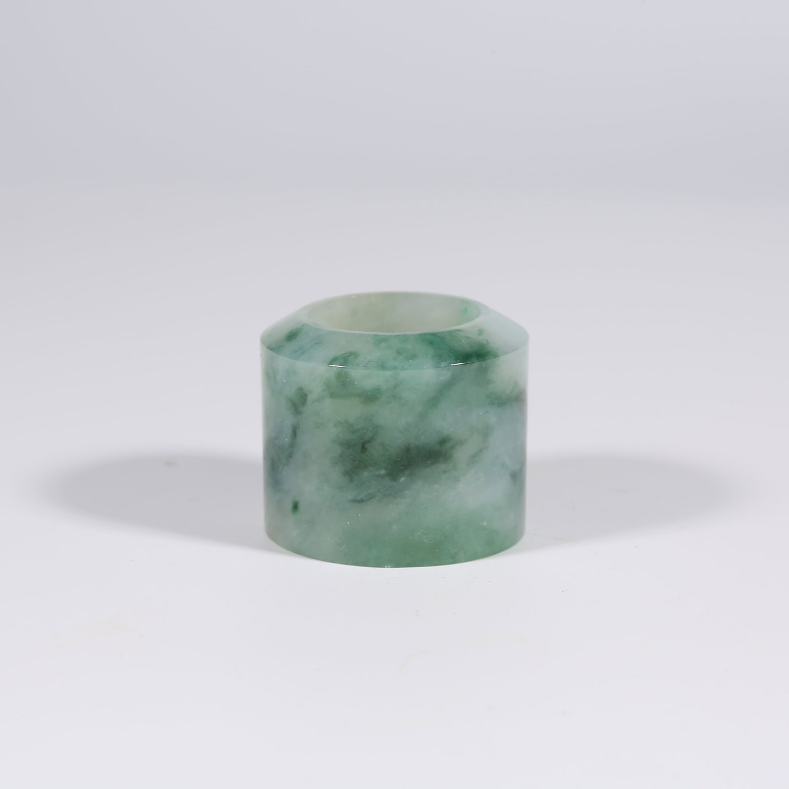 A JADEITE THUMB RING (1 of 9)
