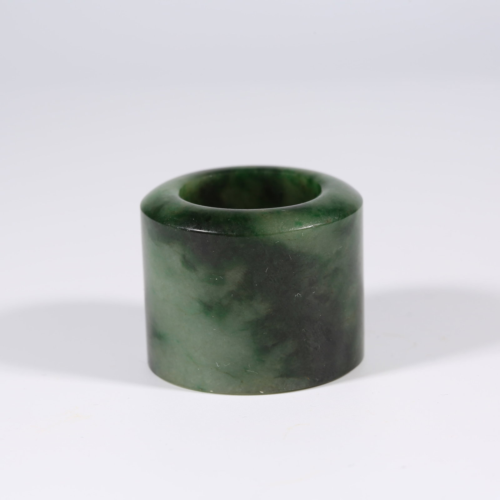 A JADEITE THUMB RING (1 of 9)