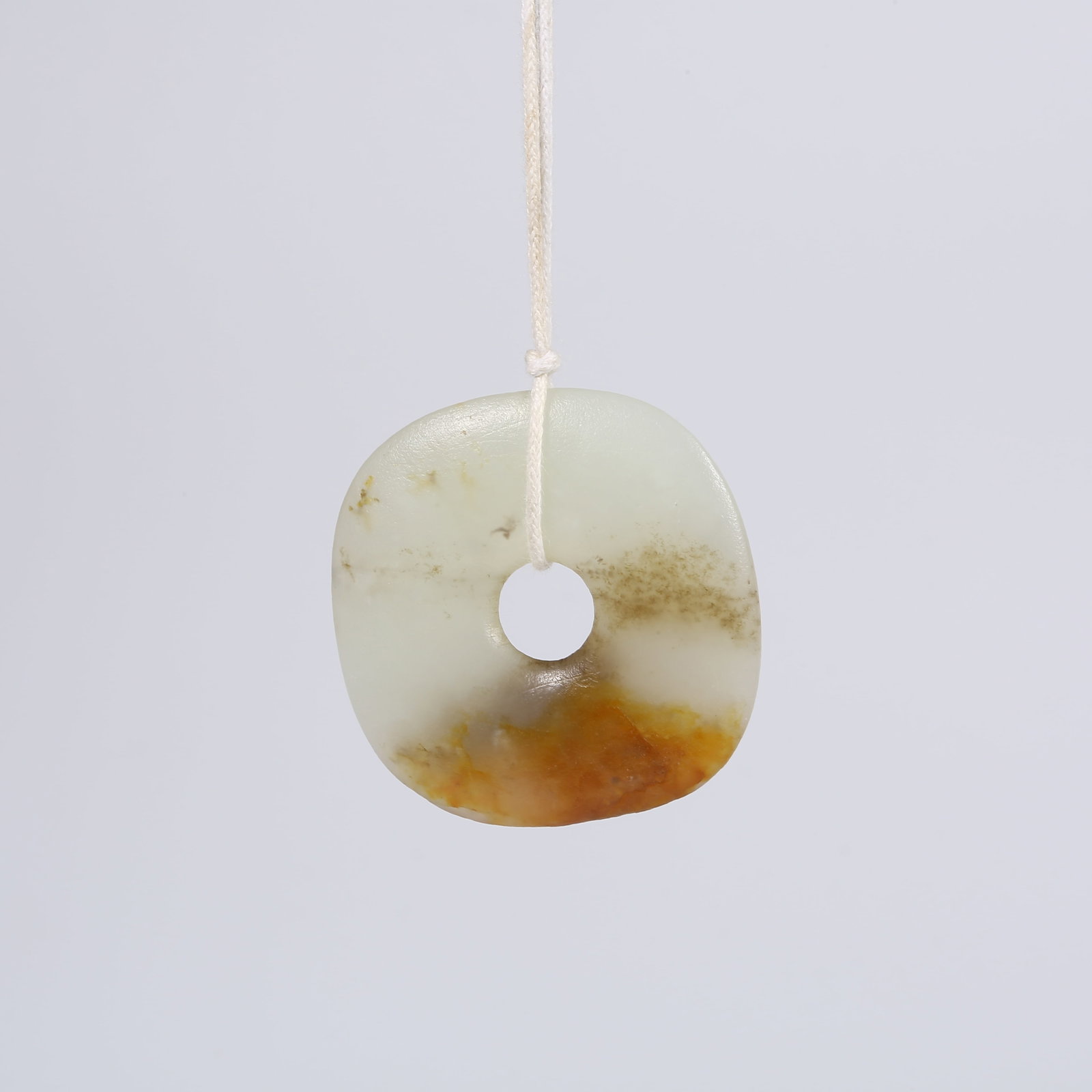 A ANCIENT JADE SMALL LINKED BI DISK (1 of 8)